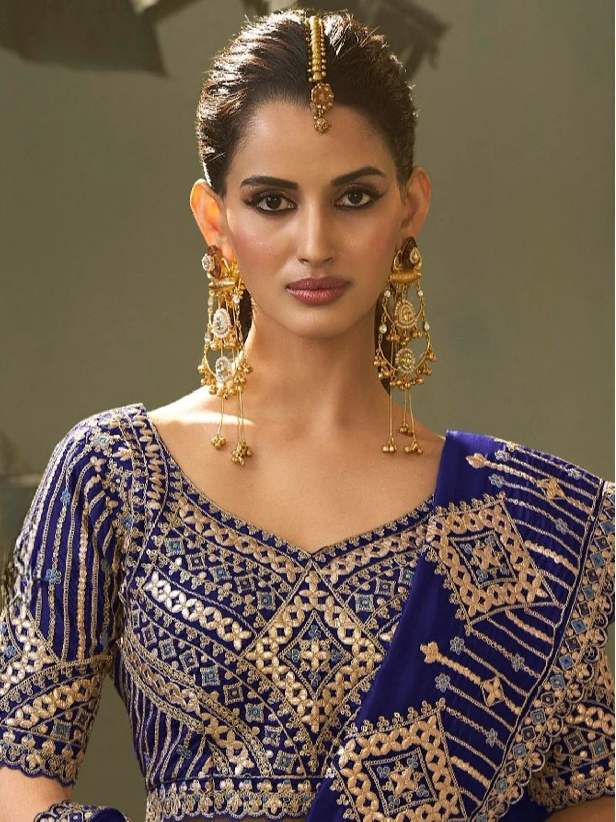 Tarani bamber silk royal blue saree upper body close-up highlighting blouse embroidery