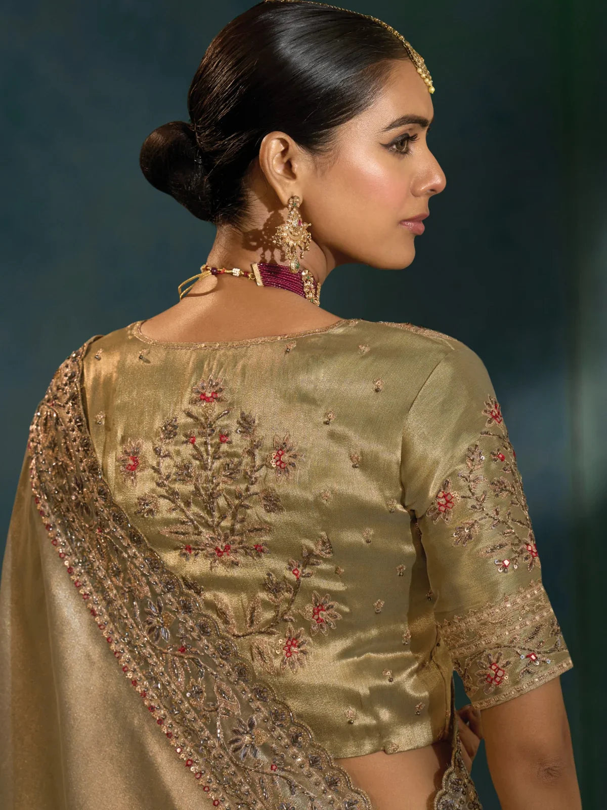 Tarani golden banarasi saree back view showing blouse embroidery and intricate detailing