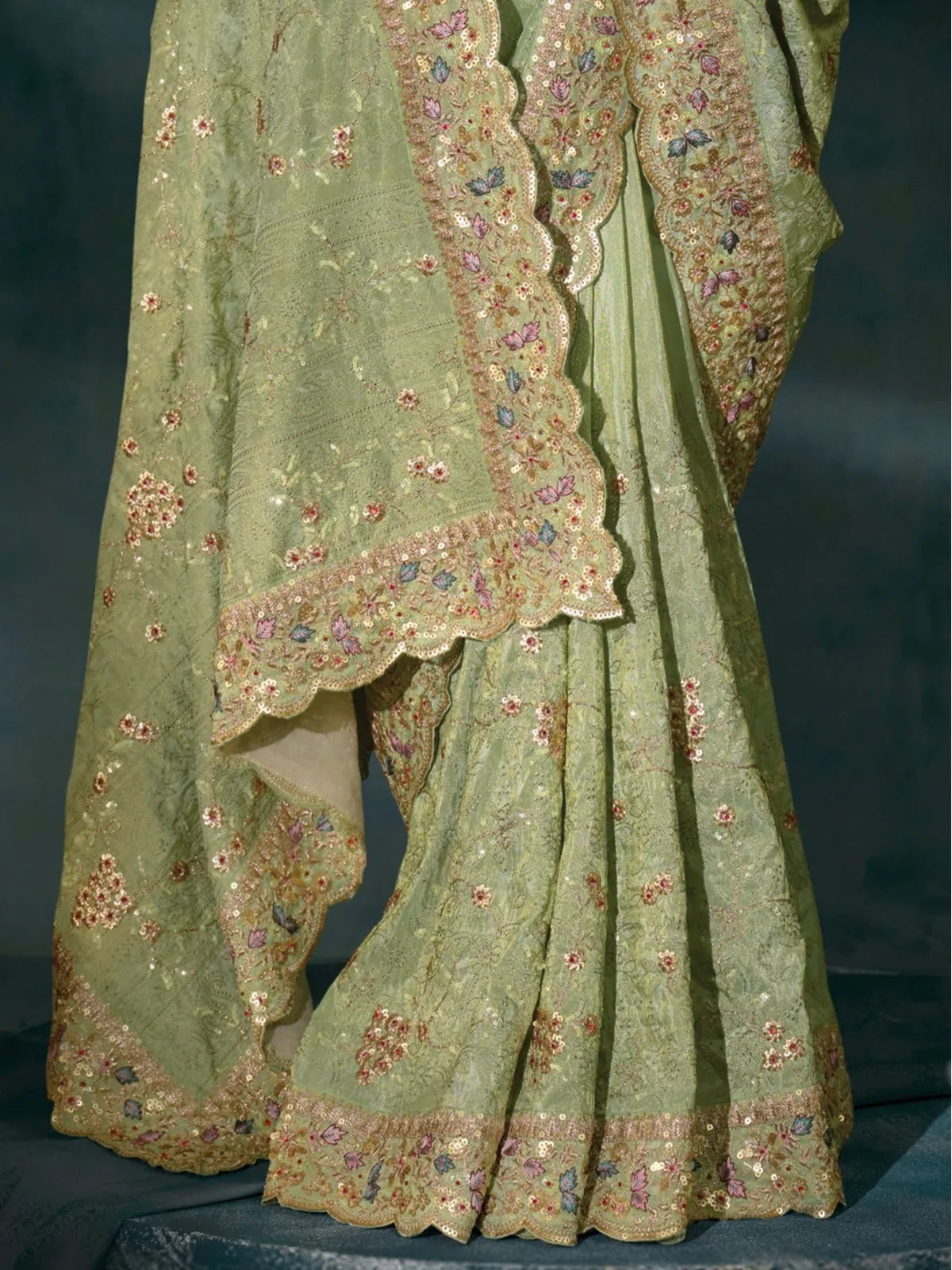 Tarani green banarasi saree closeup pallu with detailed zarkan border