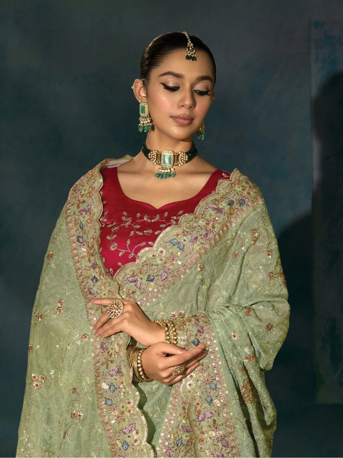 Tarani premium green banarasi saree with silk blouse upper body view
