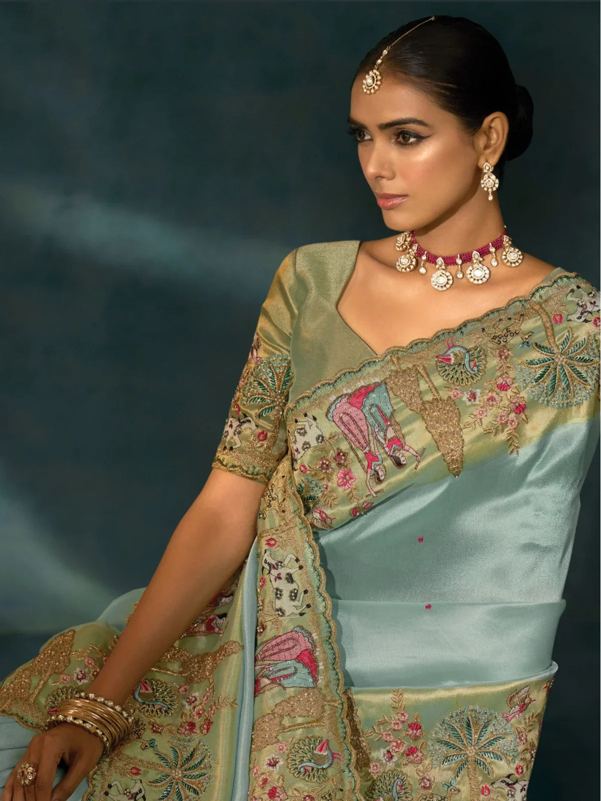 Tarani green banarasi saree upper body view with intricate zarkan embroidery and blouse