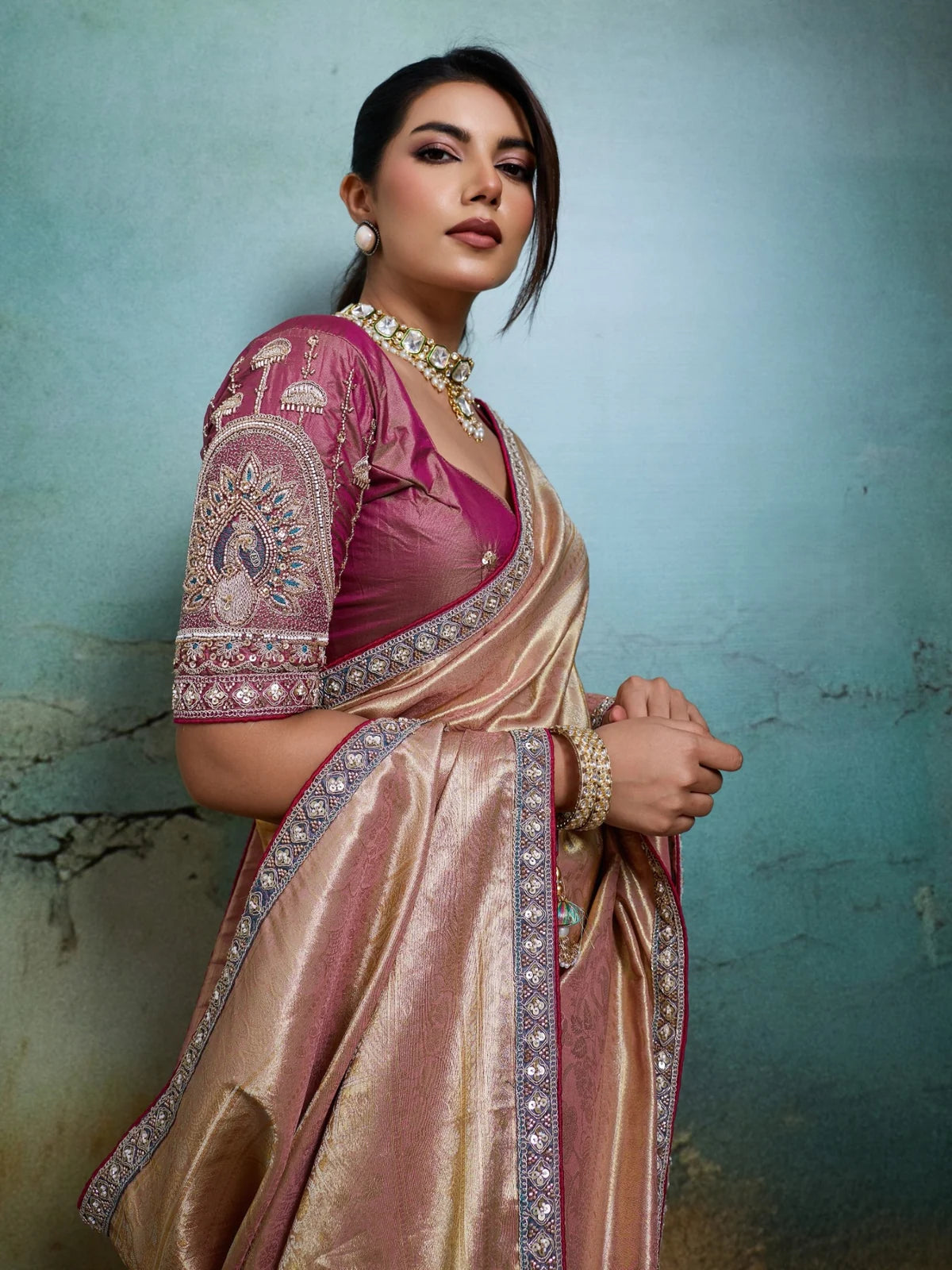 Tarani pink Banarasi saree blouse closeup with cutdana sleeve embroidery and lace border