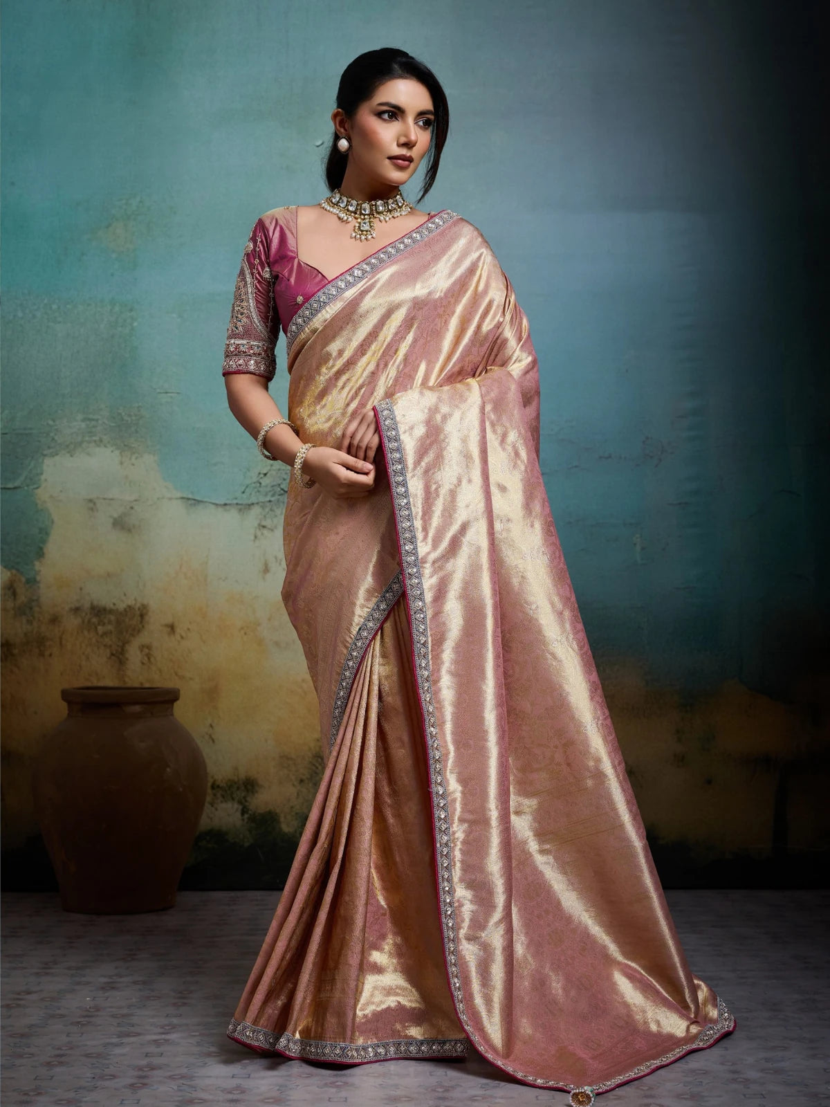 Tarani pink Banarasi saree blouse closeup with cutdana sleeve embroidery and lace border