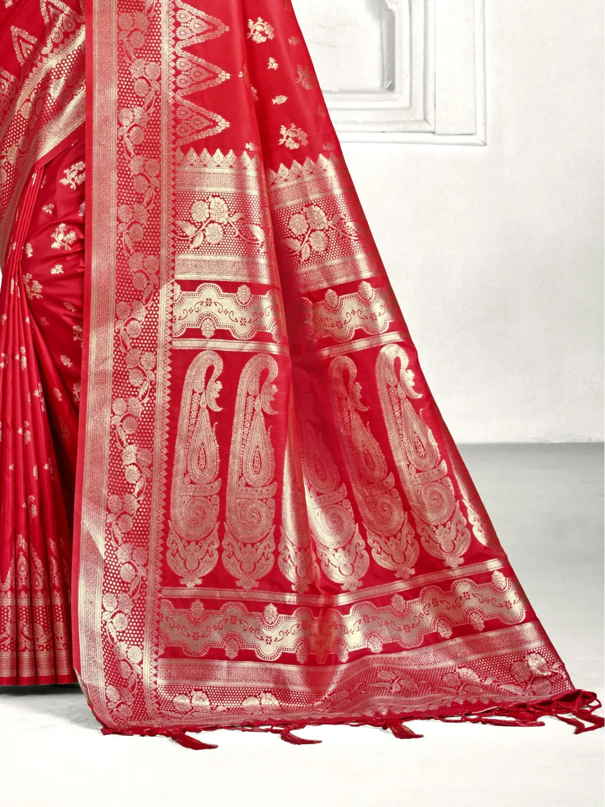 Tarani Banarasi red saree close-up of pallu showing detailed zari motifs