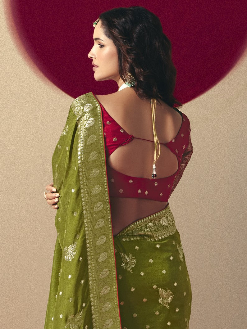 Tarani premium saree upper body closeup with contrast blouse and weaving design