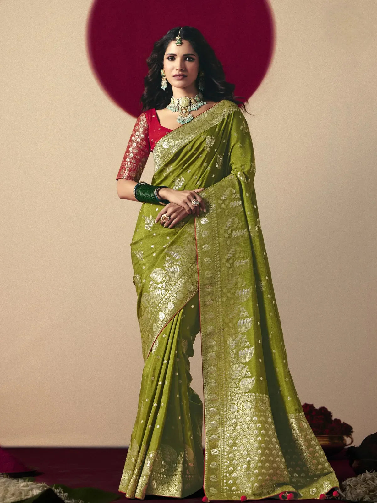 Tarani premium green bemberg viscose saree with weaving work and tussles paired with contrast blouse