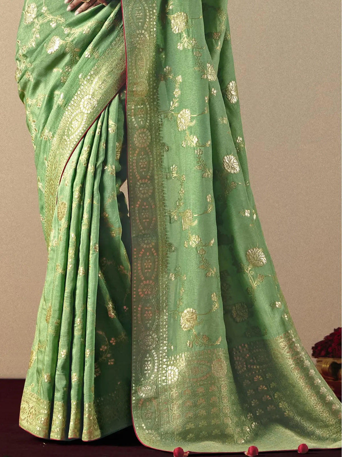 Tarani green bemberg viscose saree pallu closeup highlighting designer weaving and tassel details