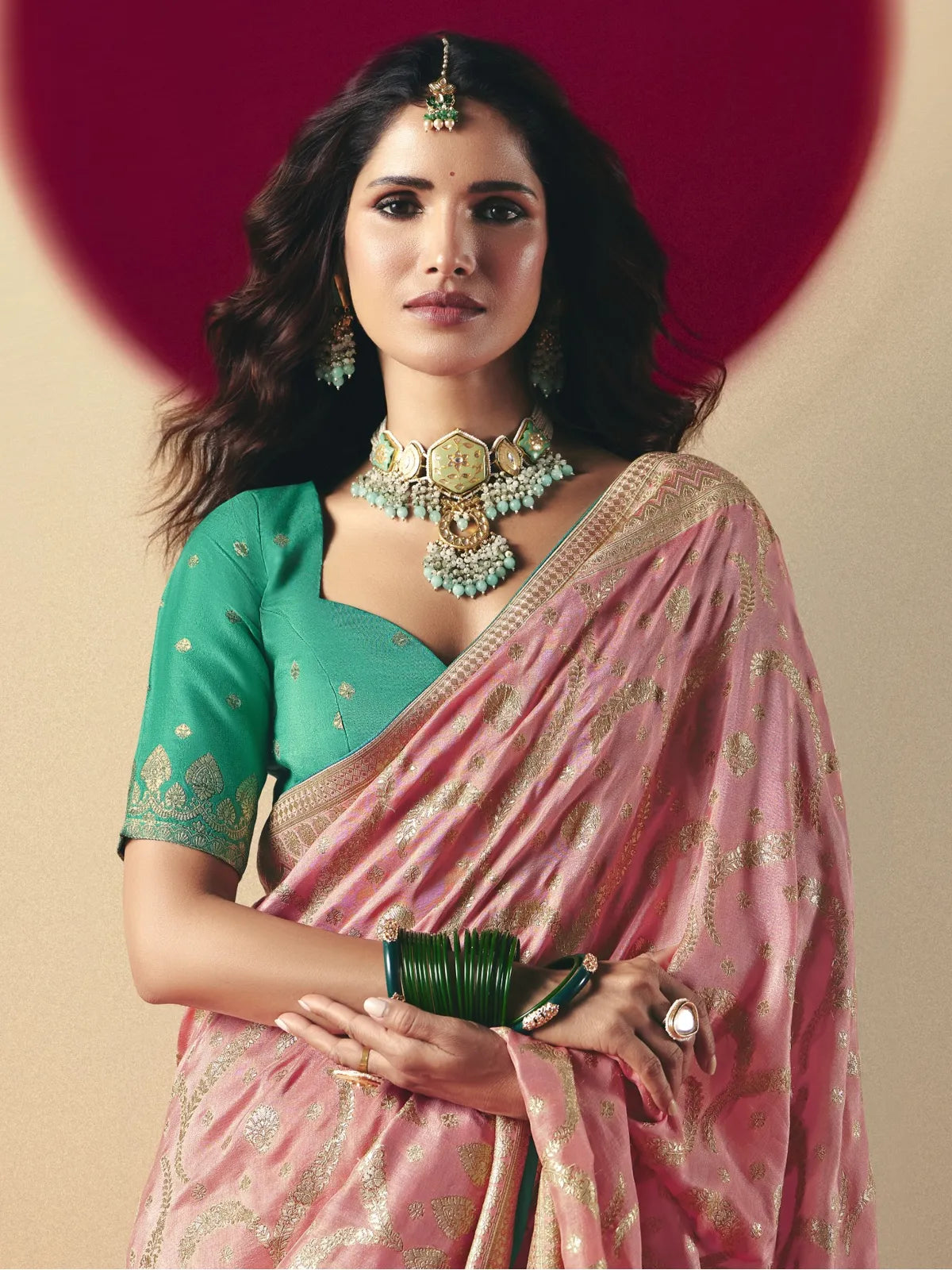 Tarani pink viscose saree front view with designer tassels and golden detailing