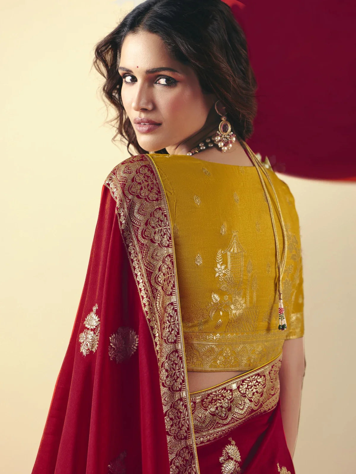 Tarani red bemberg viscose saree back blouse view with golden weaving design