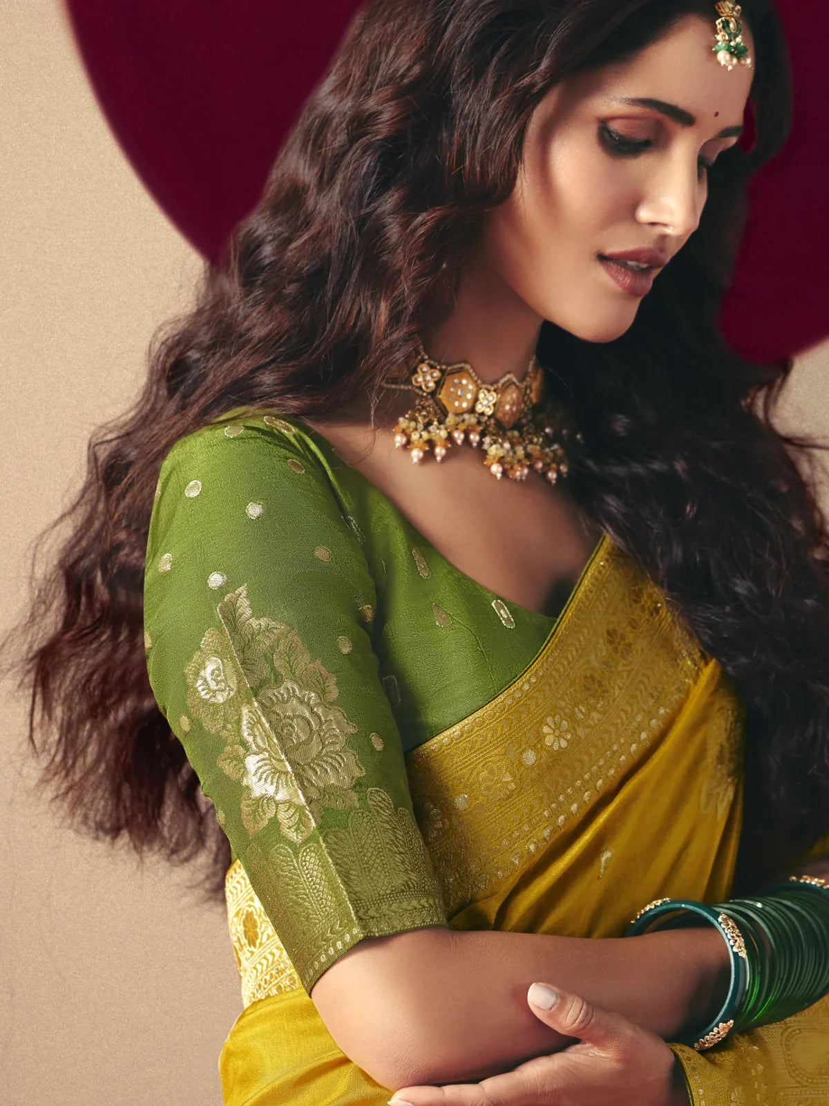 Tarani close up blouse view with intricate weaving on green blouse
