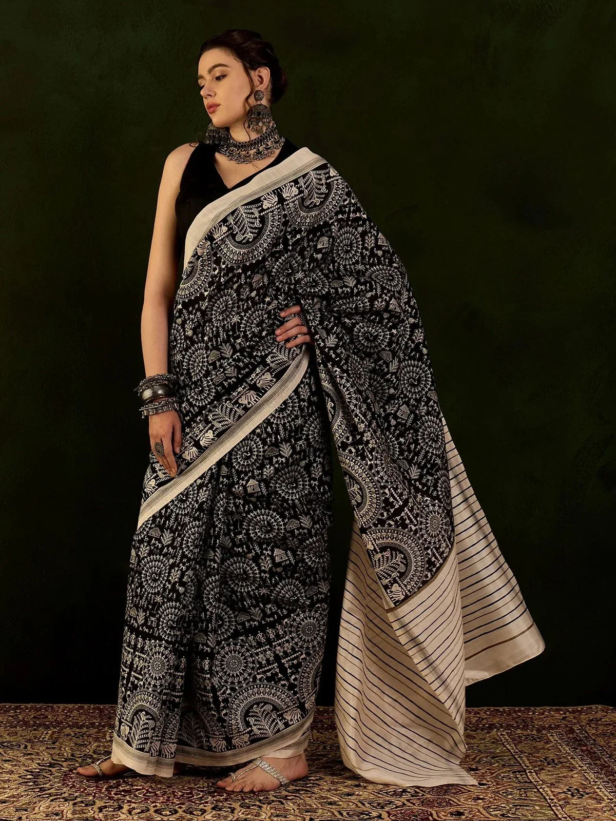 Tarani Bhagalpur black saree with white warli prints and beige striped pallu front full view