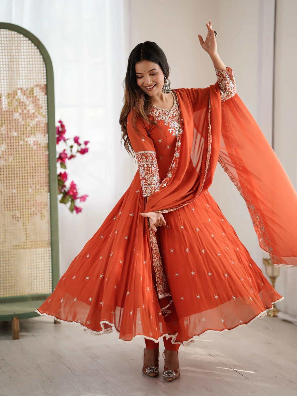 Tarani designer orange blooming faux full-length anarkali suit with dupatta and embroidery work