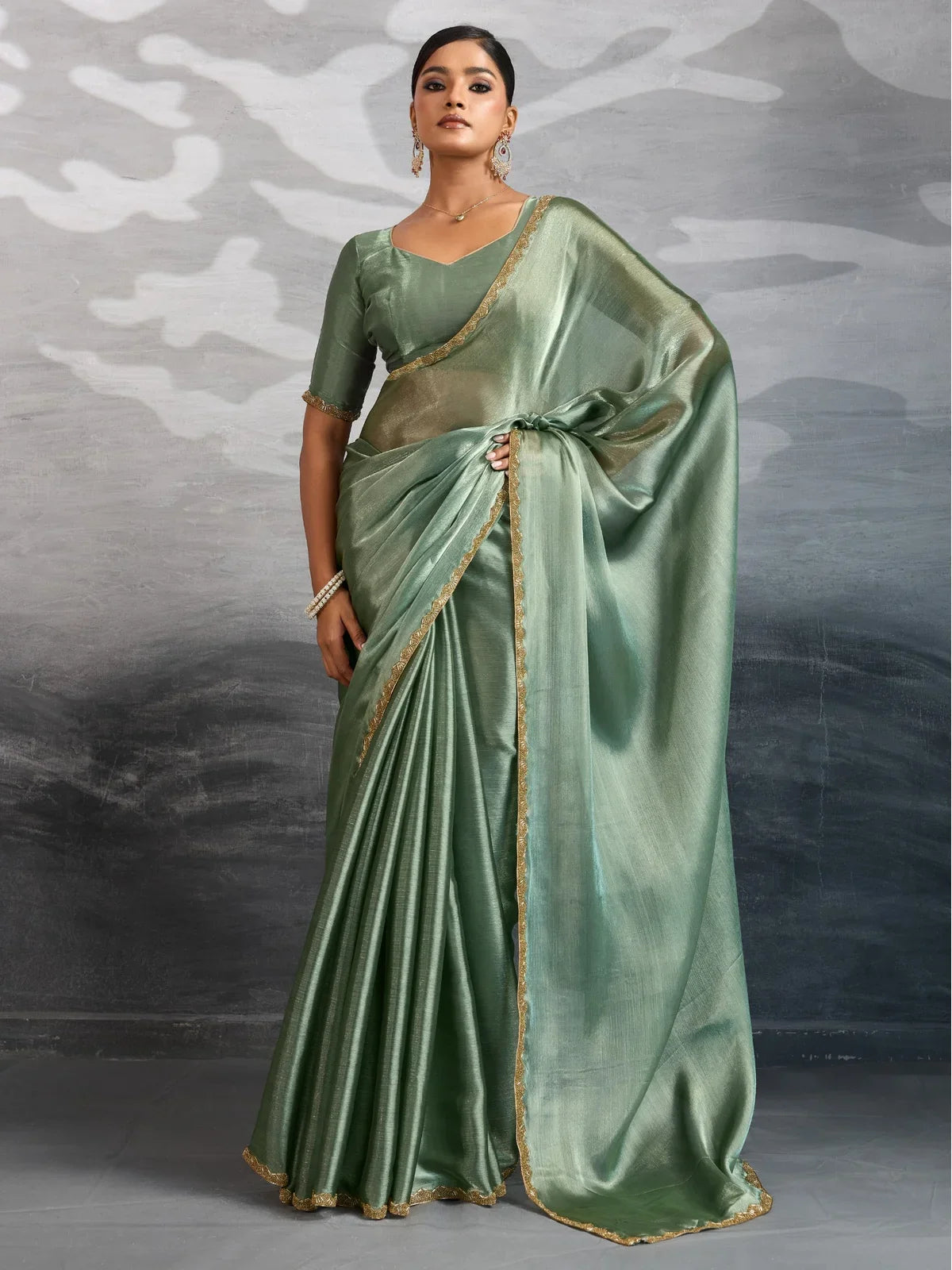 Tarani green chiffon saree full view with beads and cutdana lace work for festive and party wear