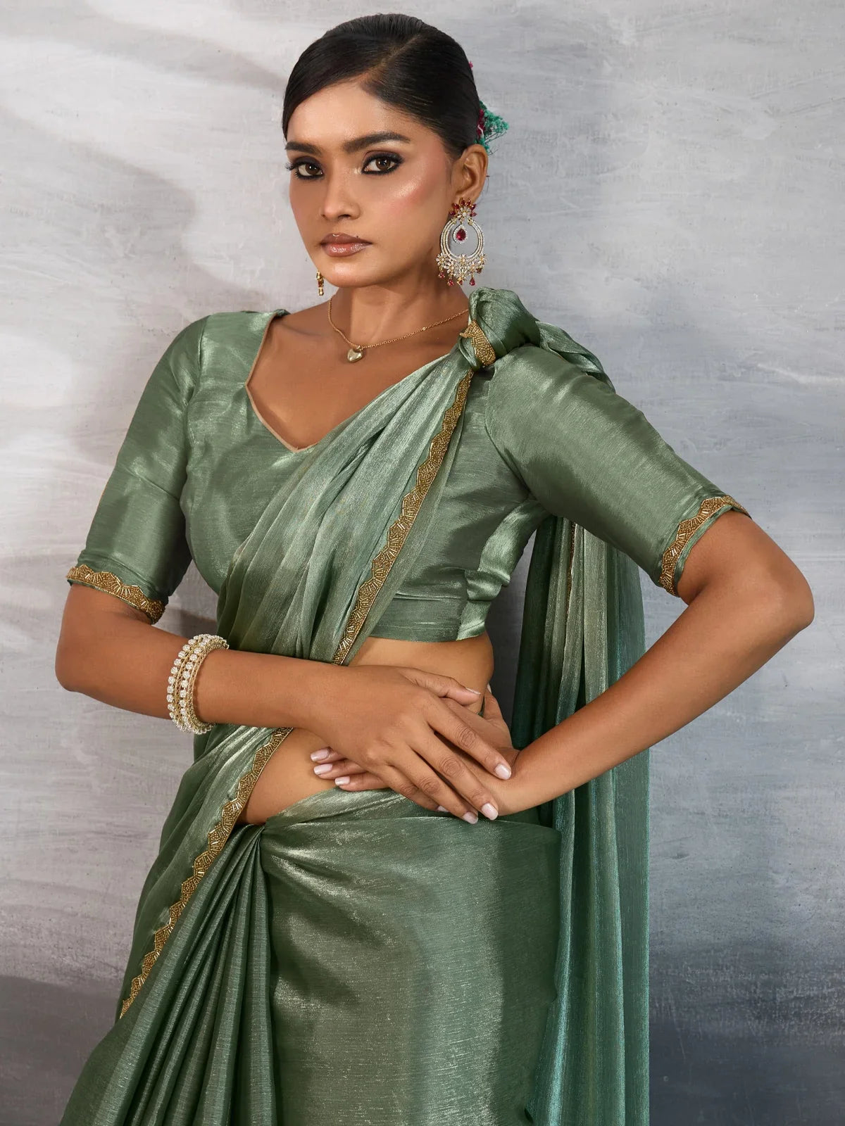 Tarani green chiffon saree upper body view with lace sleeve running blouse