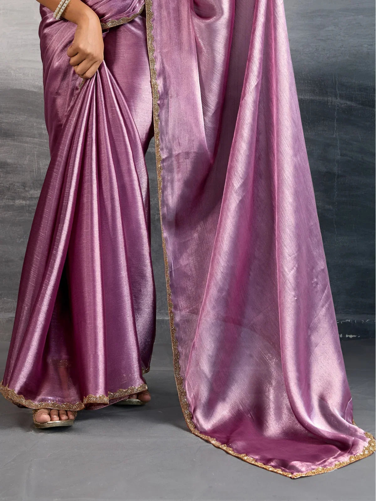 Tarani lavender party wear saree with elegant pallu and soft shimmer for festive look