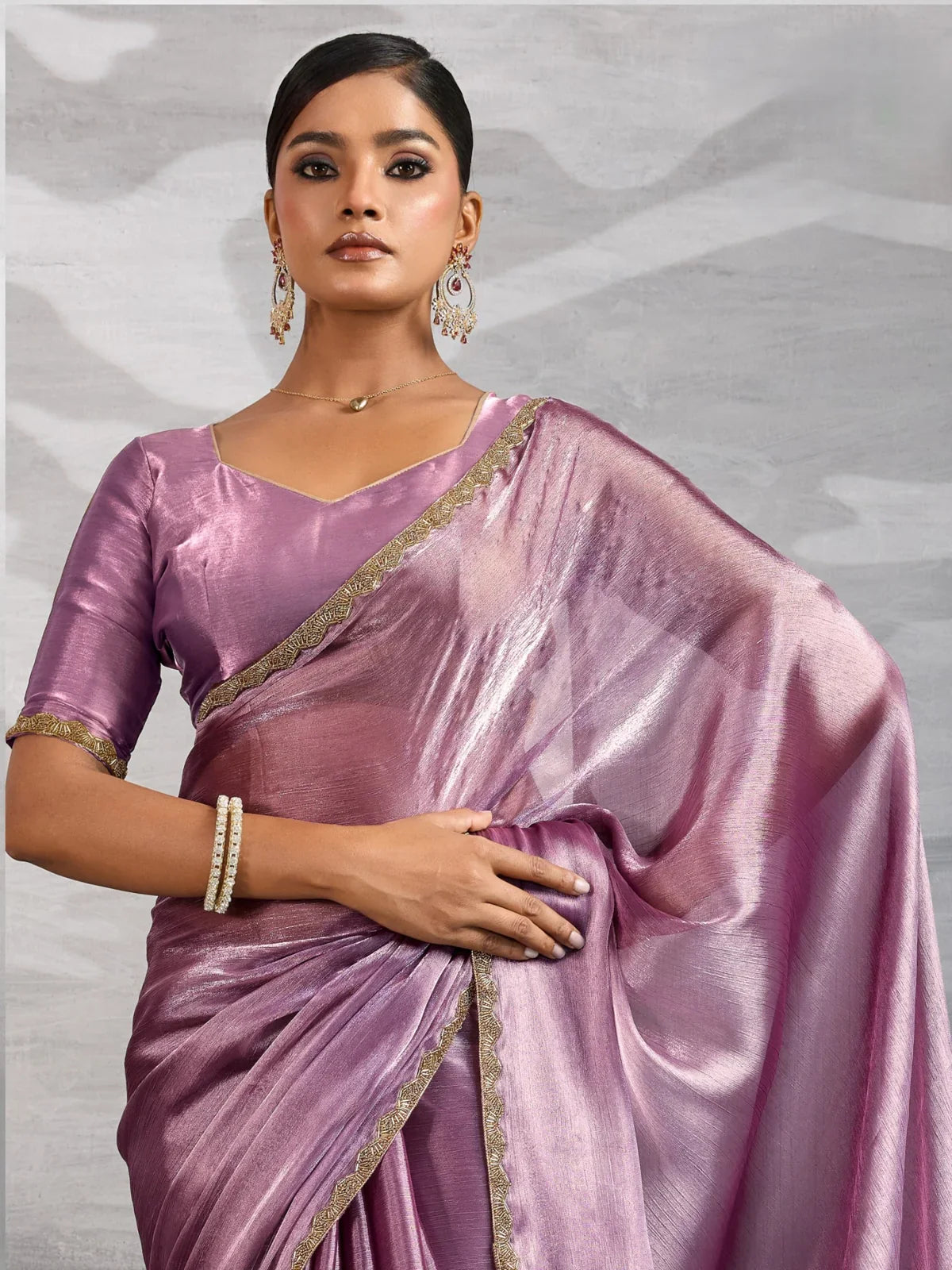 Tarani lavender chiffon saree with lace blouse shown in upper body front view