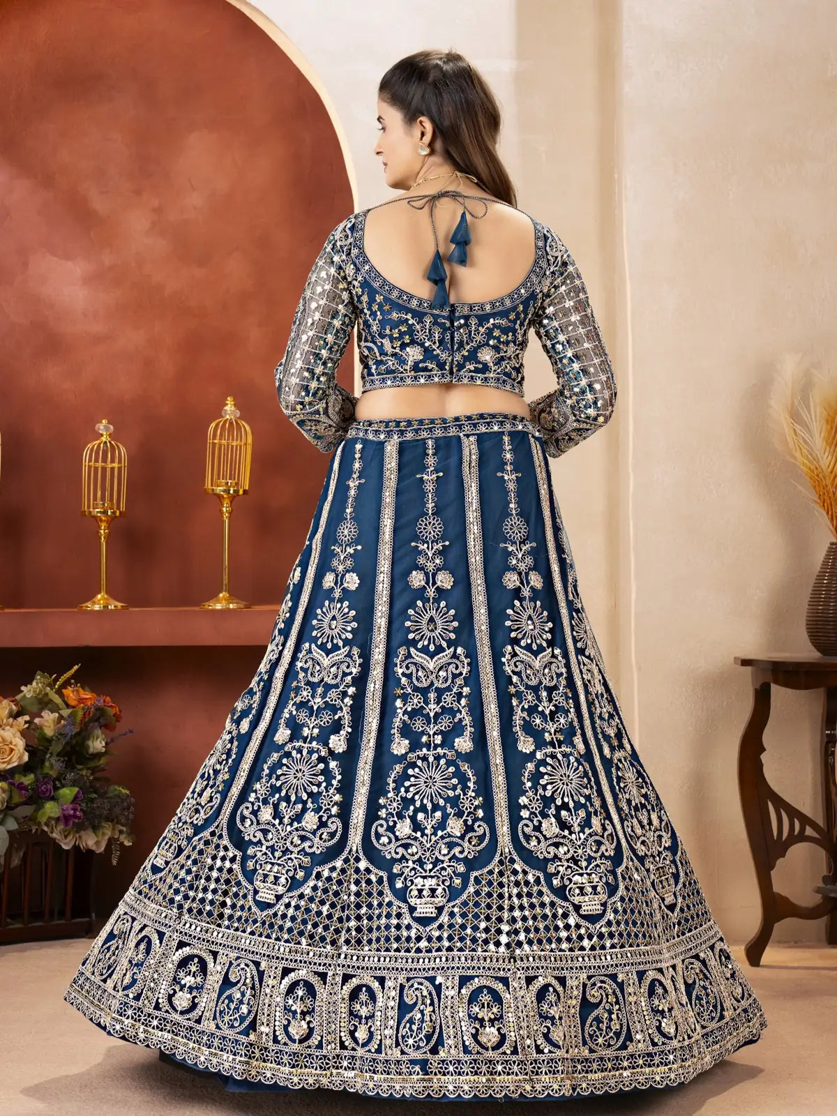 Tarani navy blue butterfly net lehenga with tassel tie-up back blouse, full back view