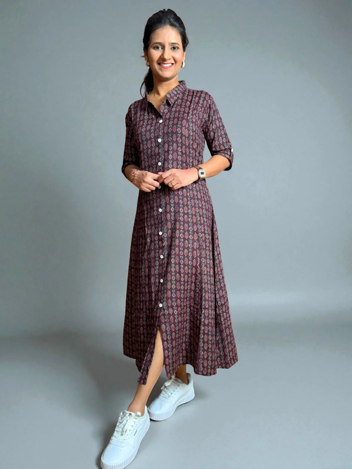 Tarani maroon capsule cotton dress front slit view showing stylish flare and sneakers