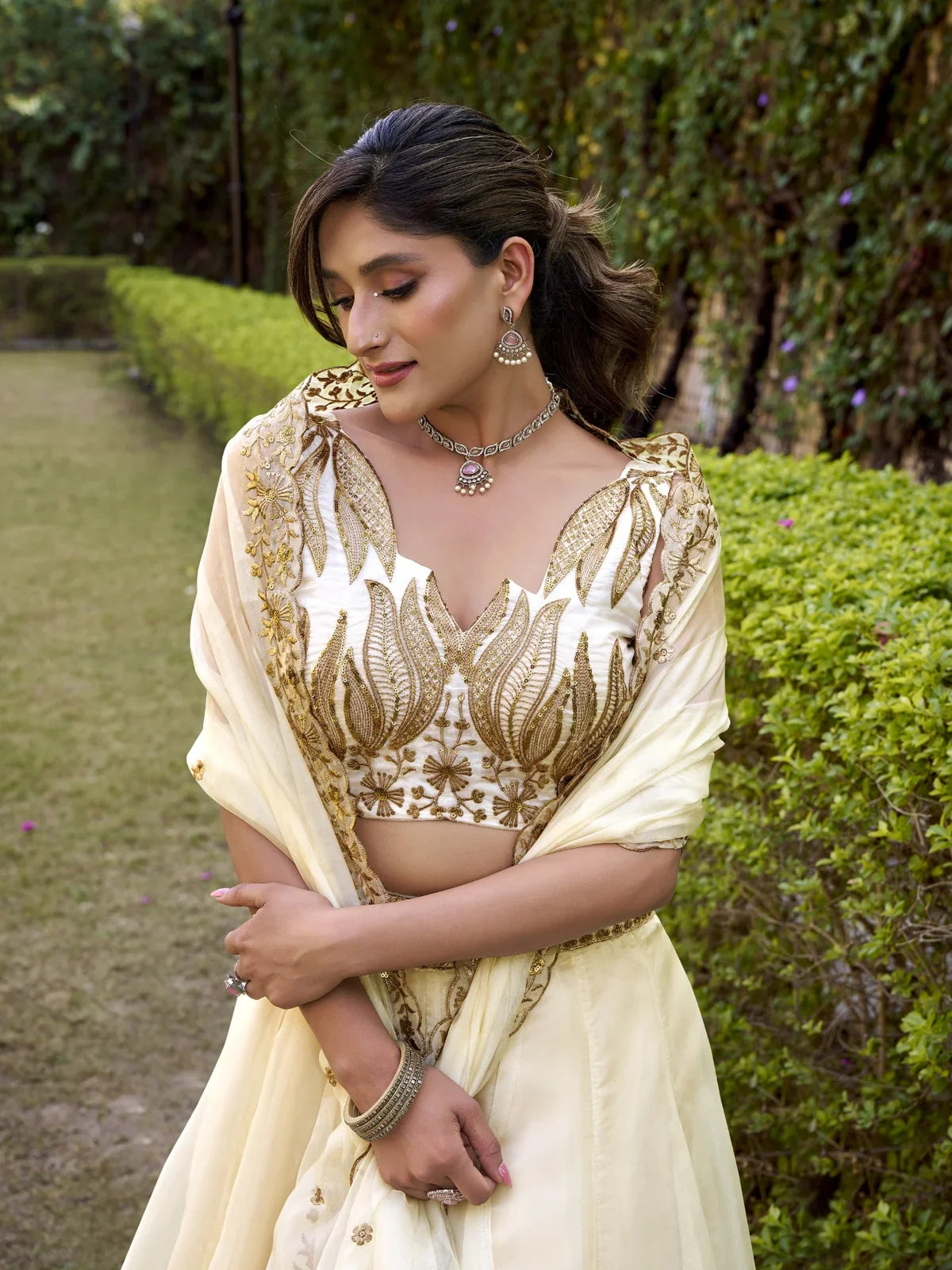 Tarani Chanda Silk lehenga in cream with elegant embroidered blouse front close-up