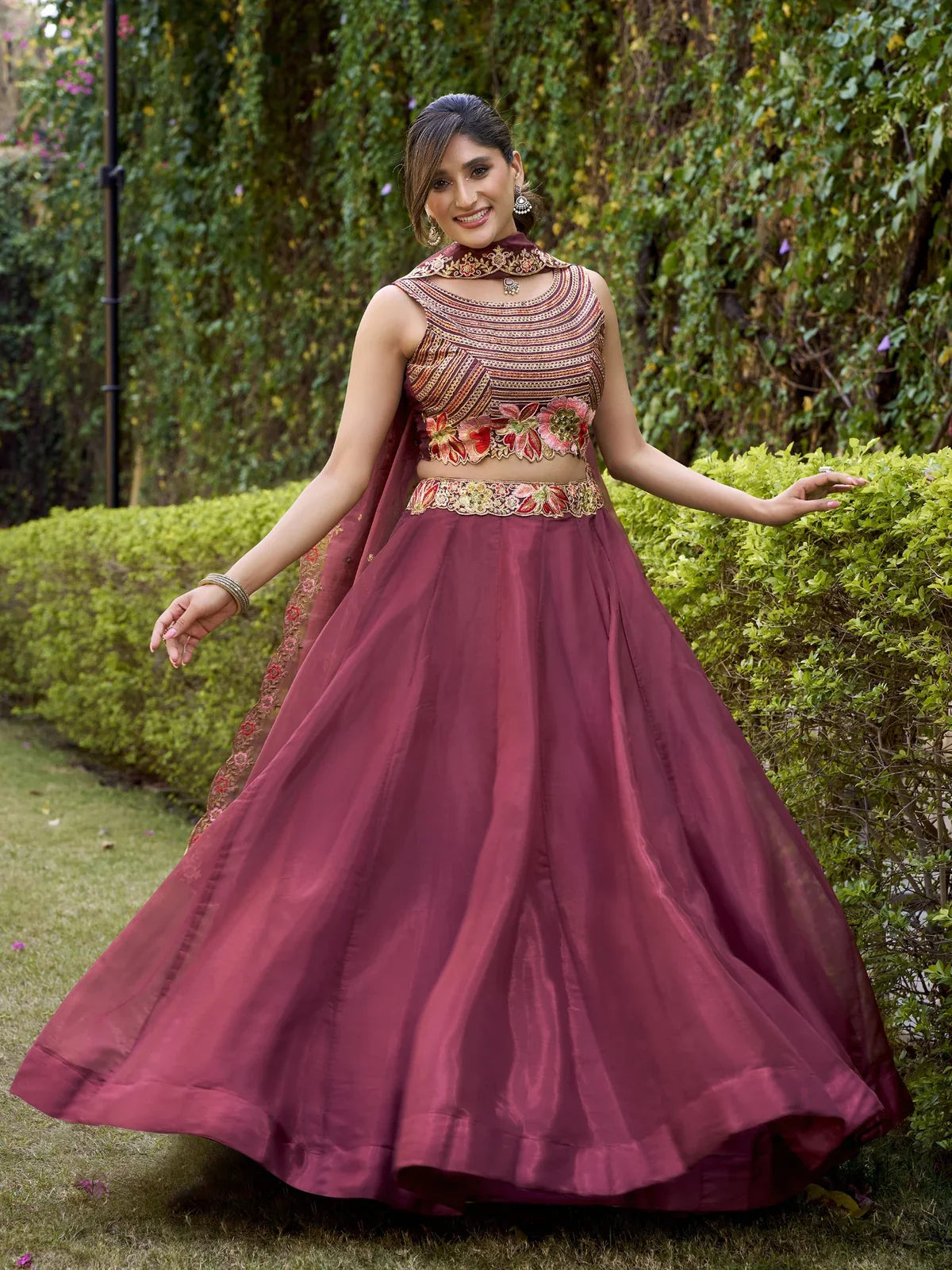 Tarani maroon lehenga with flowing flair and detailed embroidery on waistband and blouse – Prachika