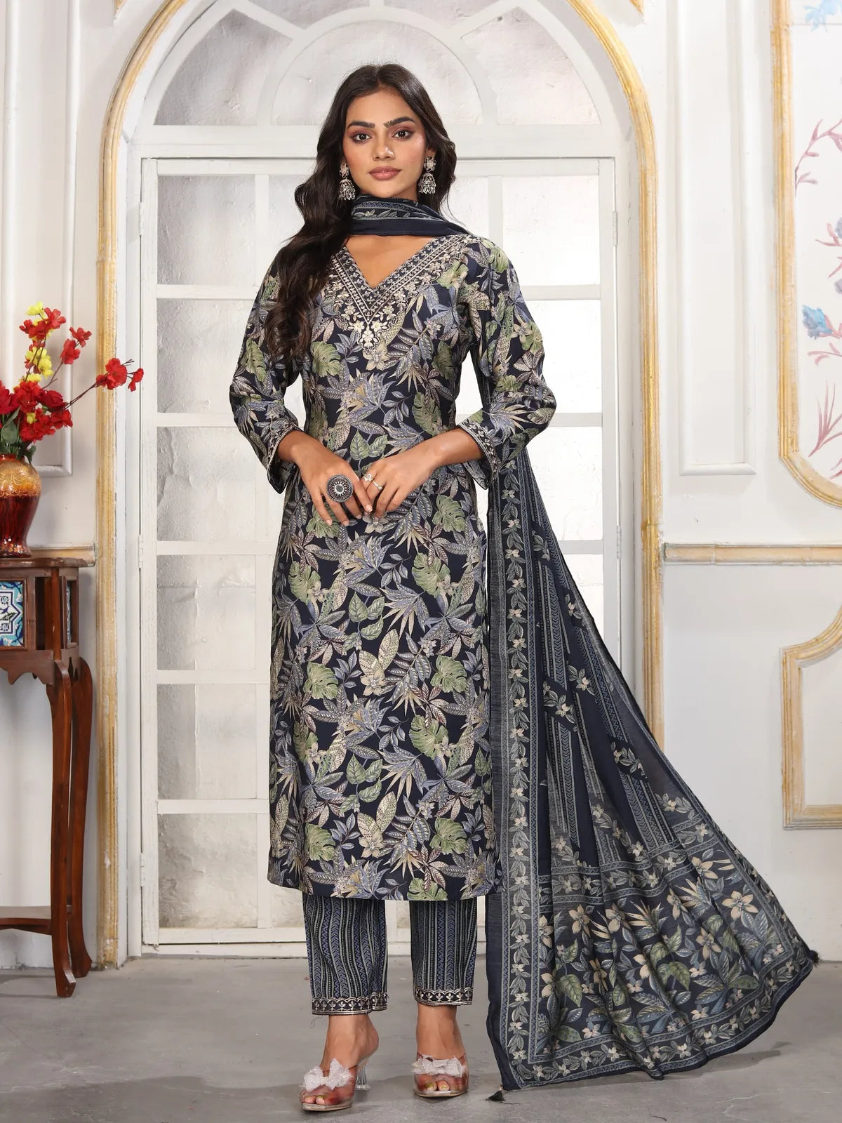 Tarani premium green Chanderi dress with floral embroidery and stitched pants front view