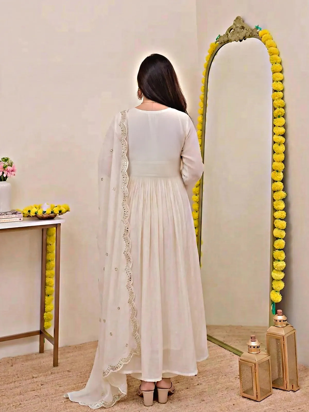 Tarani back view of white chanderi silk dress with flowing dupatta