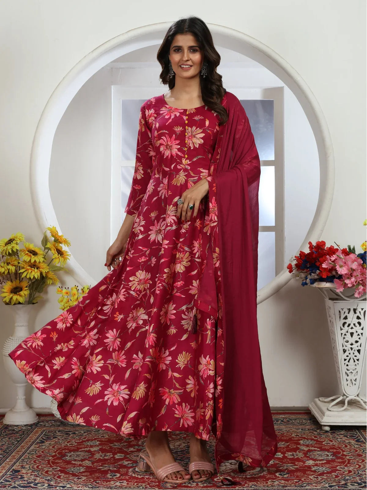 Tarani full-length maroon floral gown with dupatta spread out for styling