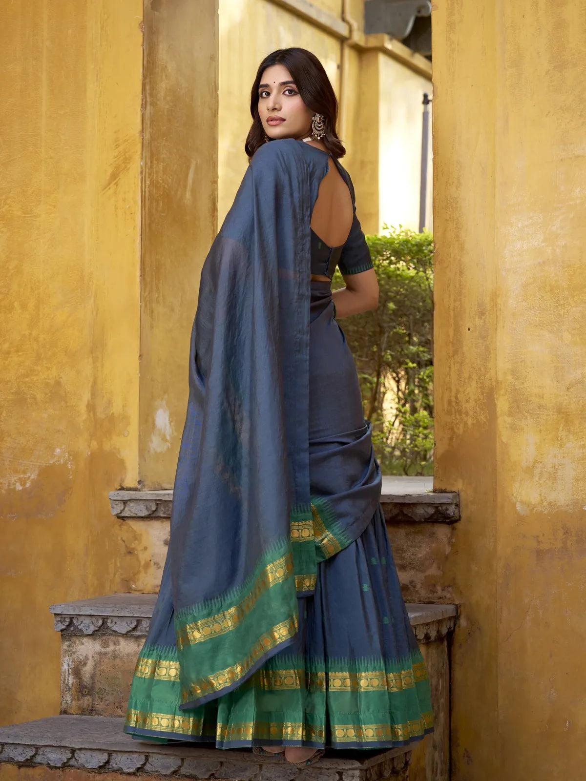 Tarani blue lehenga back view with zari dupatta and stylish blouse design