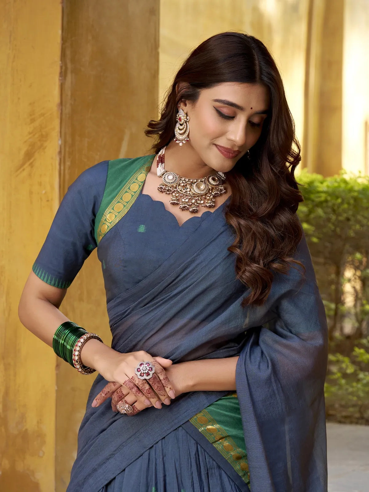 Tarani blue chanderi lehenga upper body view with zari weaving blouse and jewellery