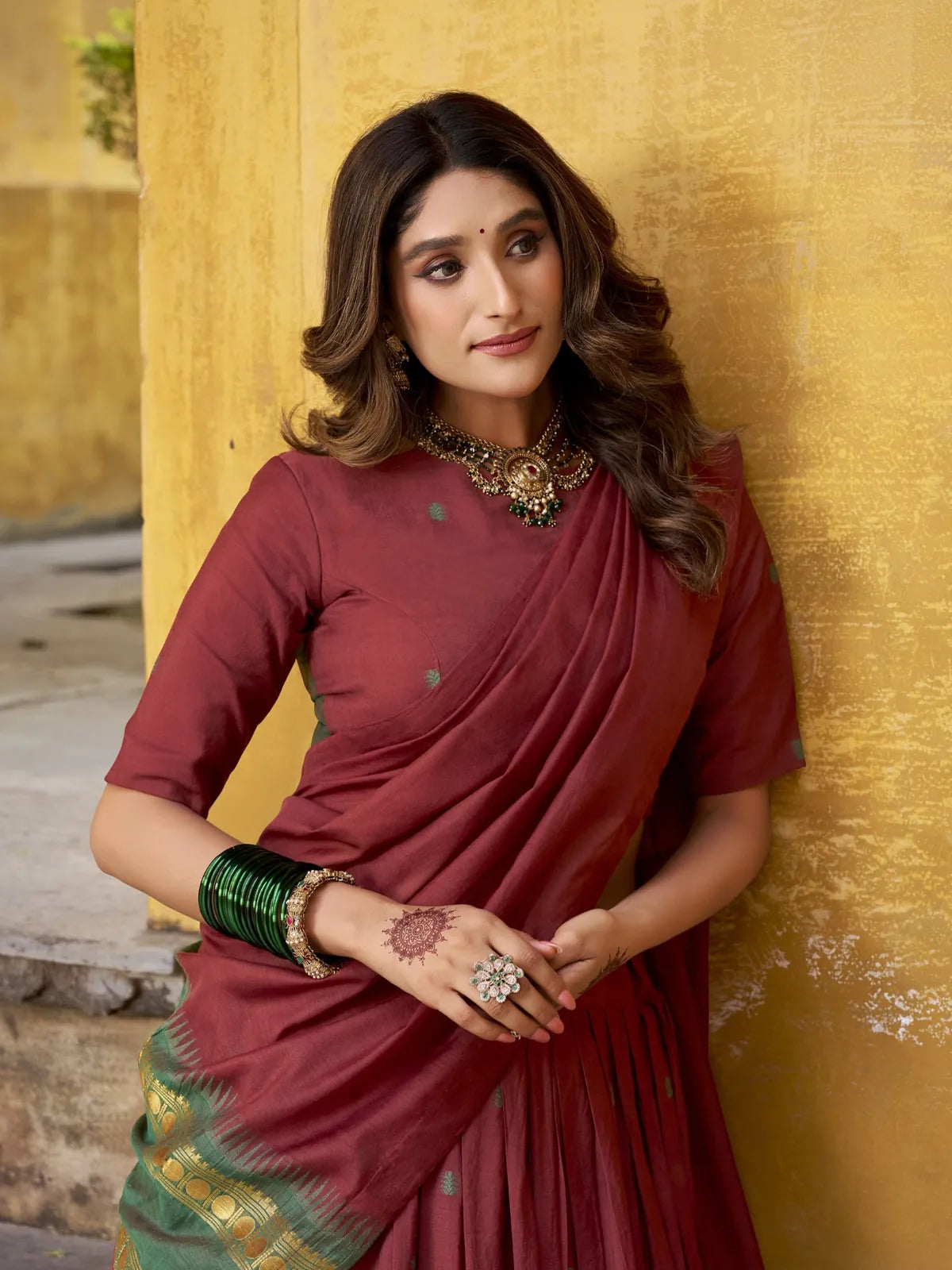 Tarani upper body close-up of maroon Chanderi lehenga blouse with elegant styling