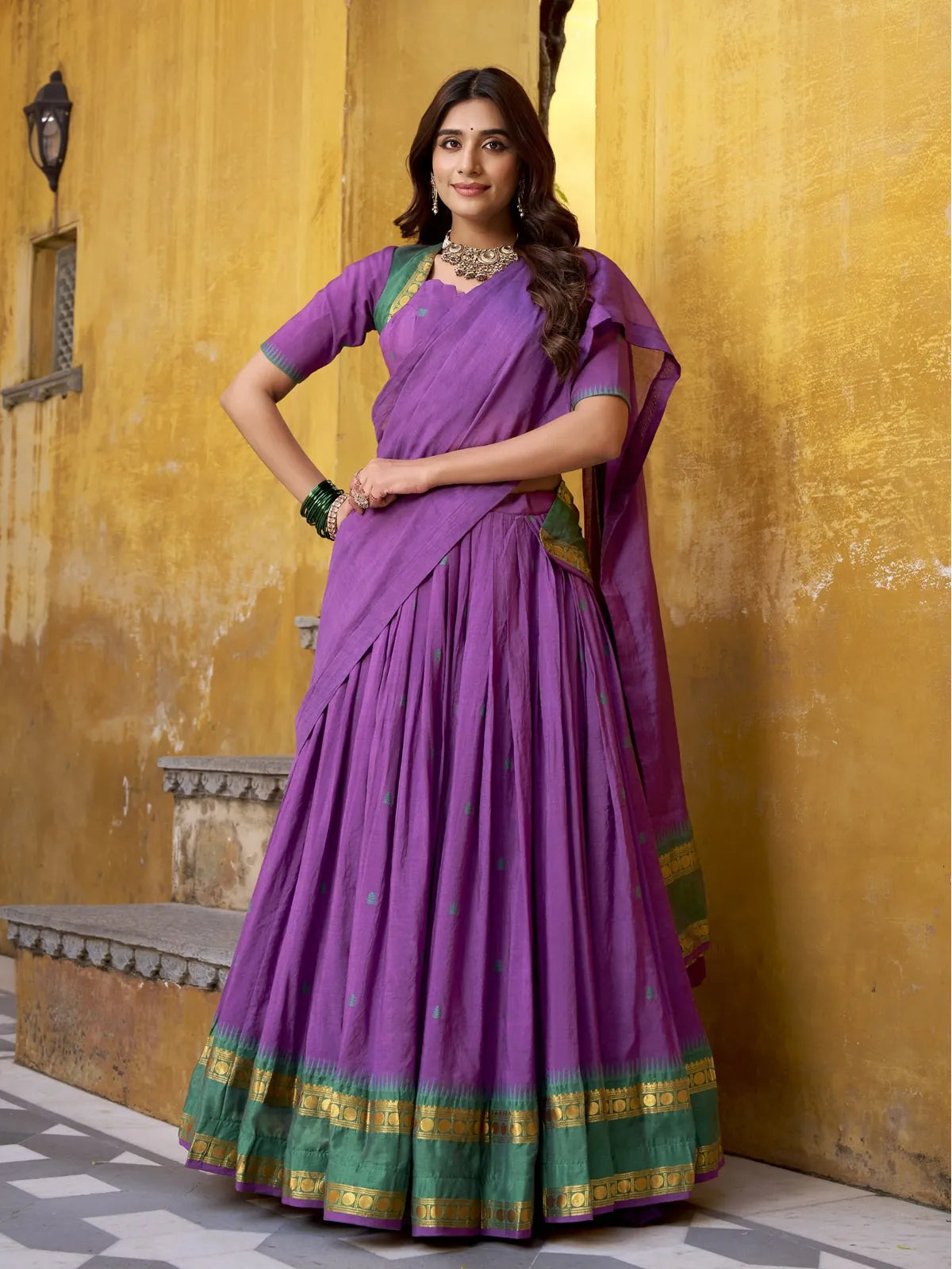 Tarani Chanderi purple lehenga with green and gold border shown in full front pose