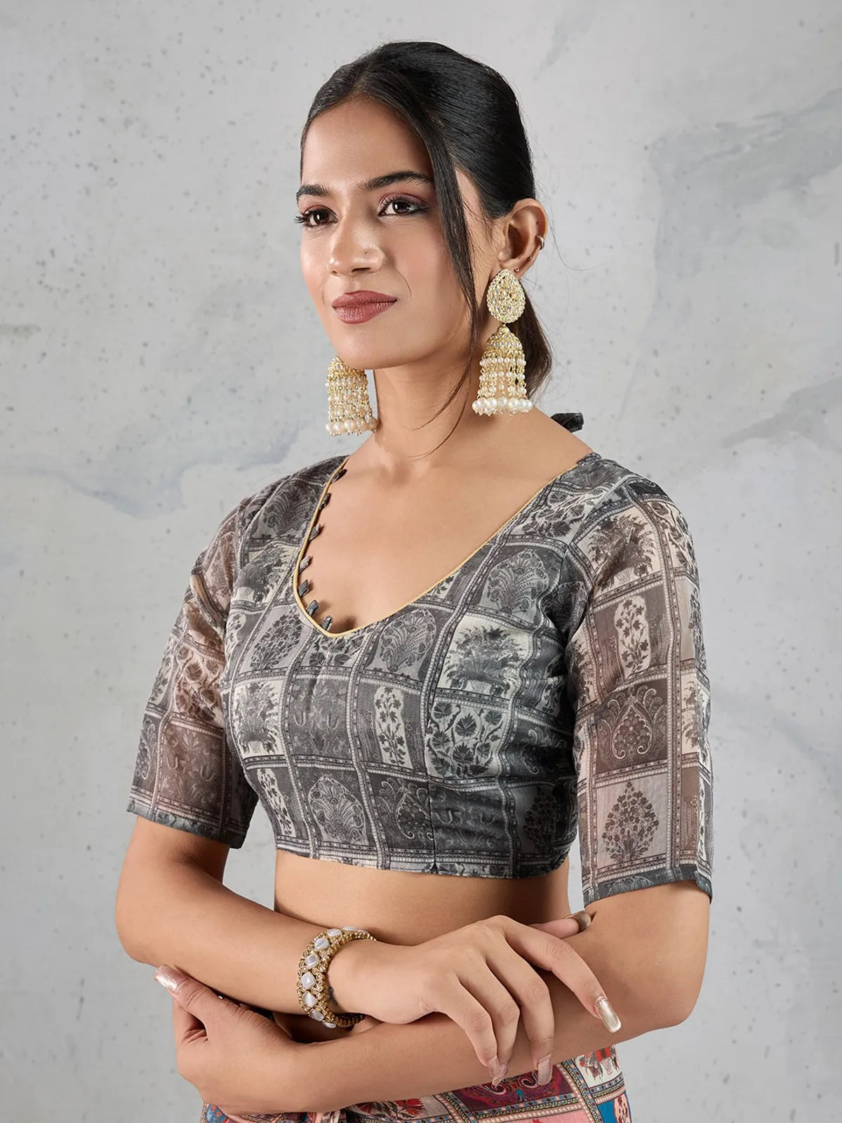 Tarani Chanderi saree blouse closeup with black printed square motifs and stylish neckline