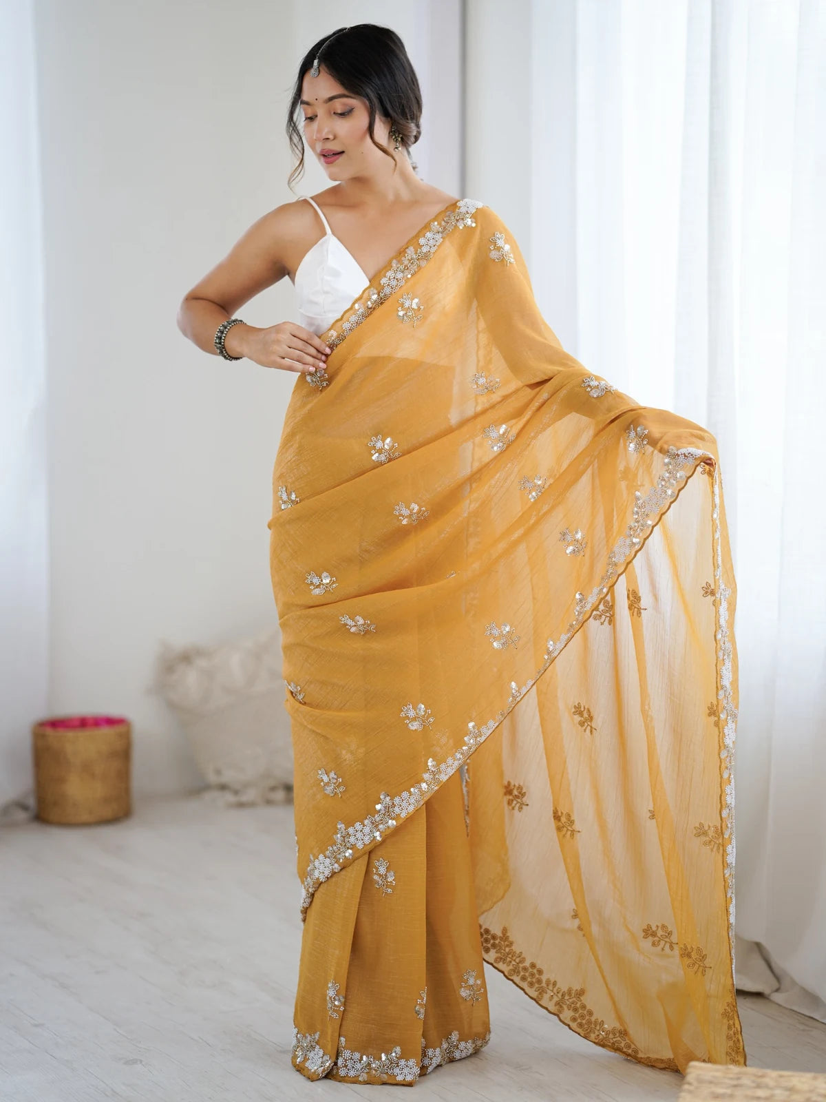 Tarani Amishi mustard chiffon crush saree front view with elegant pallu