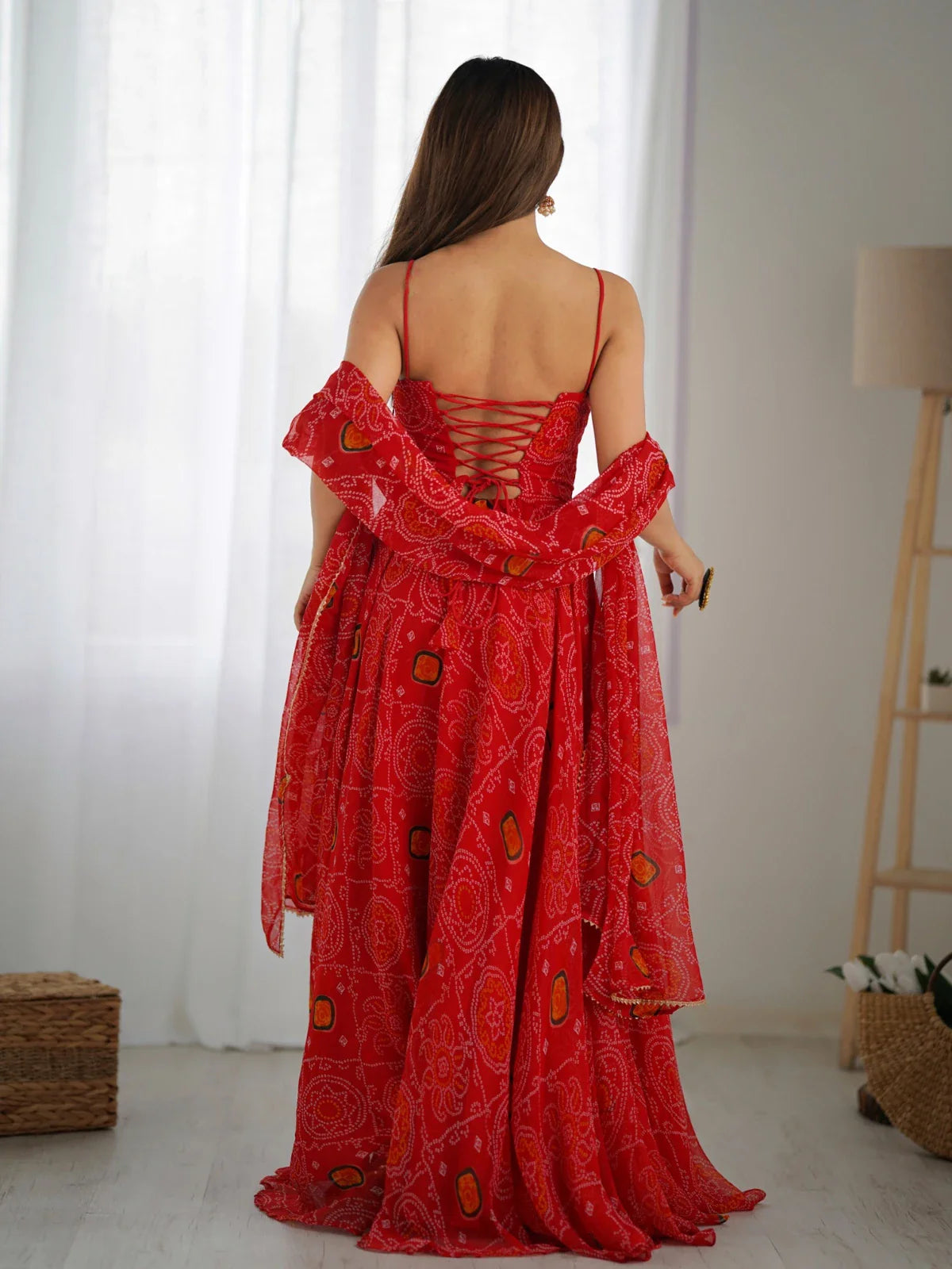 Tarani gown back view showing lace up tie-back detail in red chiffon