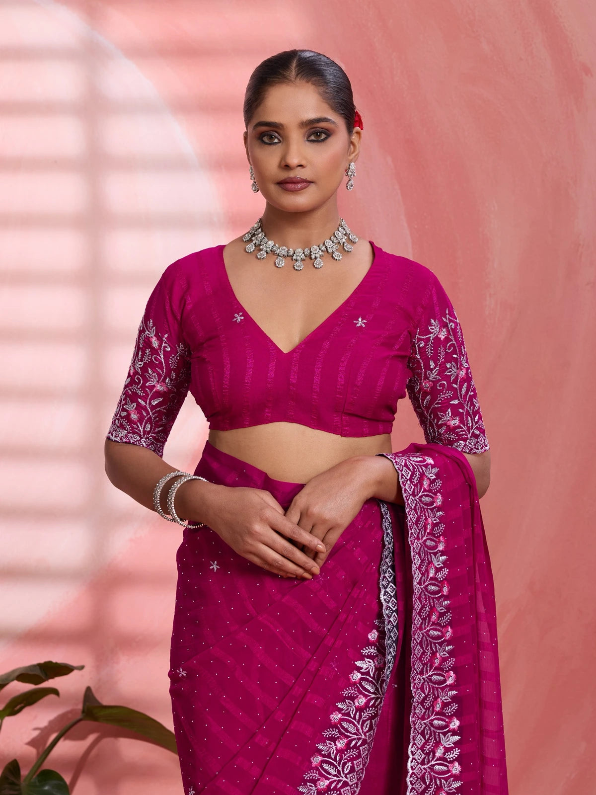 Tarani magenta solo chiffon saree with designer blouse upper body portrait view