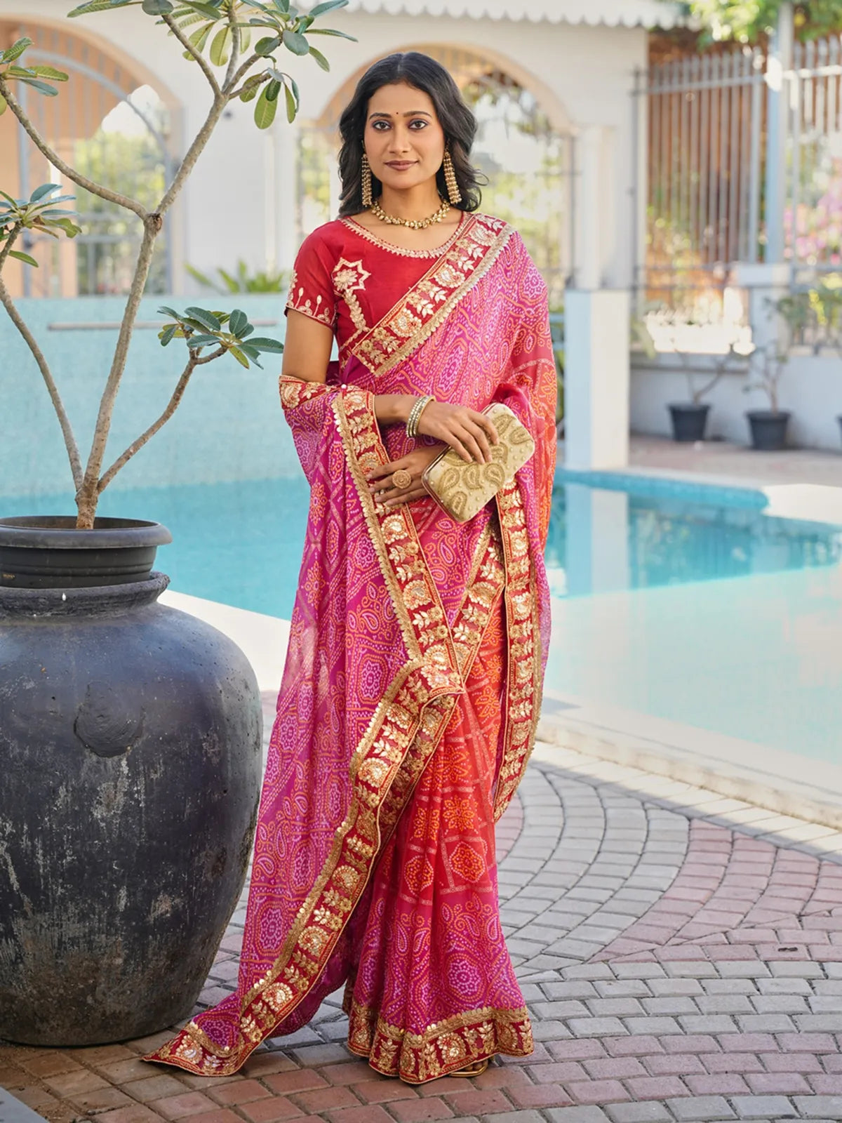Tarani pink chiffon festive saree with embroidered blouse in full front view