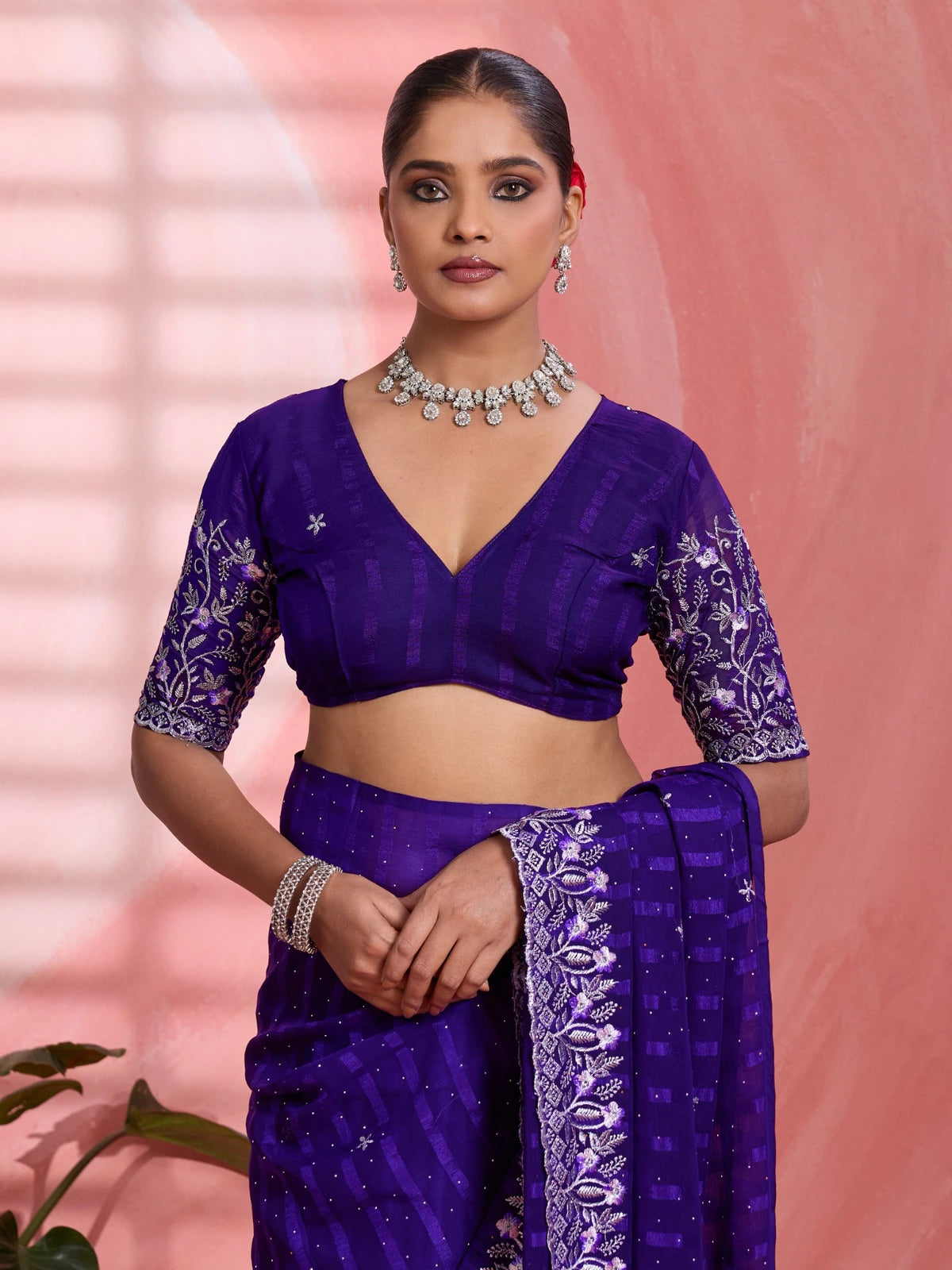 Tarani purple chiffon saree upper body view with embroidered blouse detailing