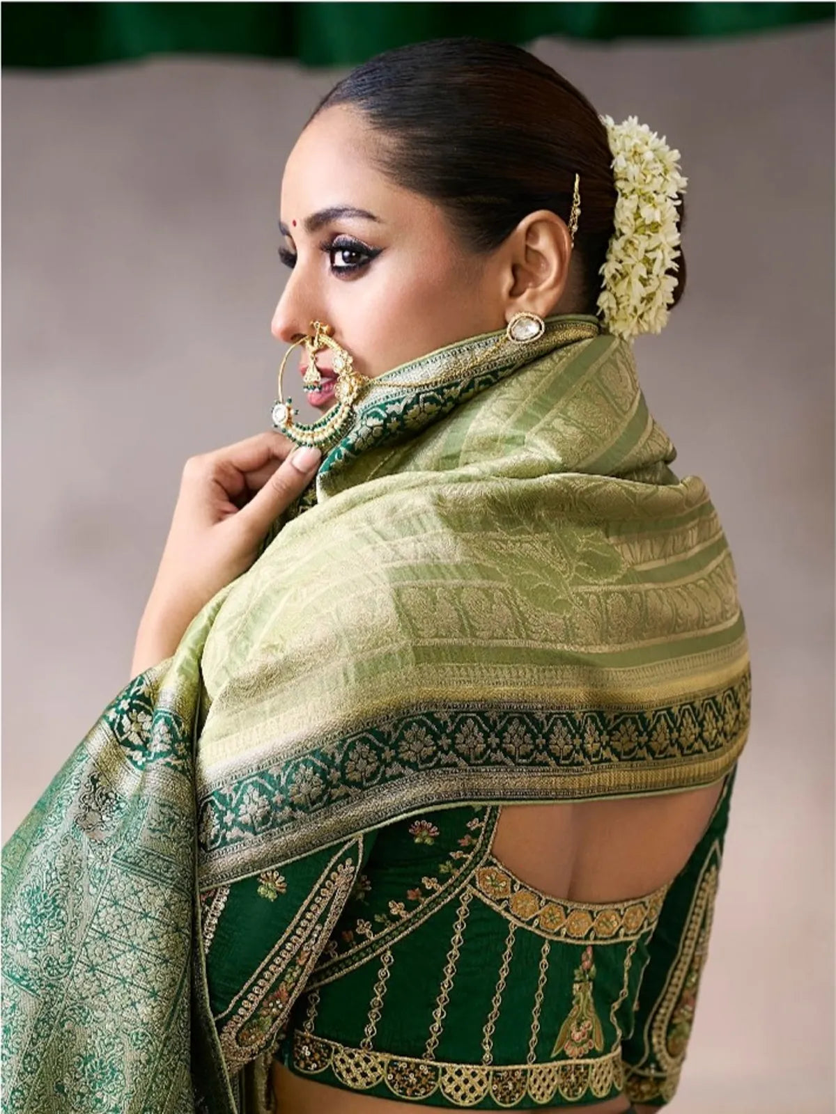 Tarani tarini Green Silk saree drape detail view for festive party and wedding wear