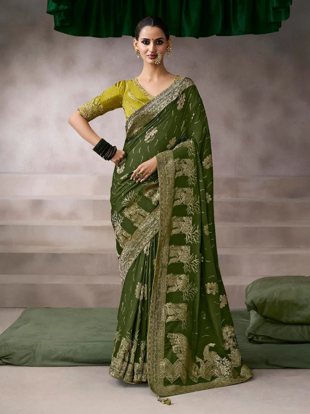 Tarani designer green chiffon silk saree with golden embroidery and matching blouse - full front view