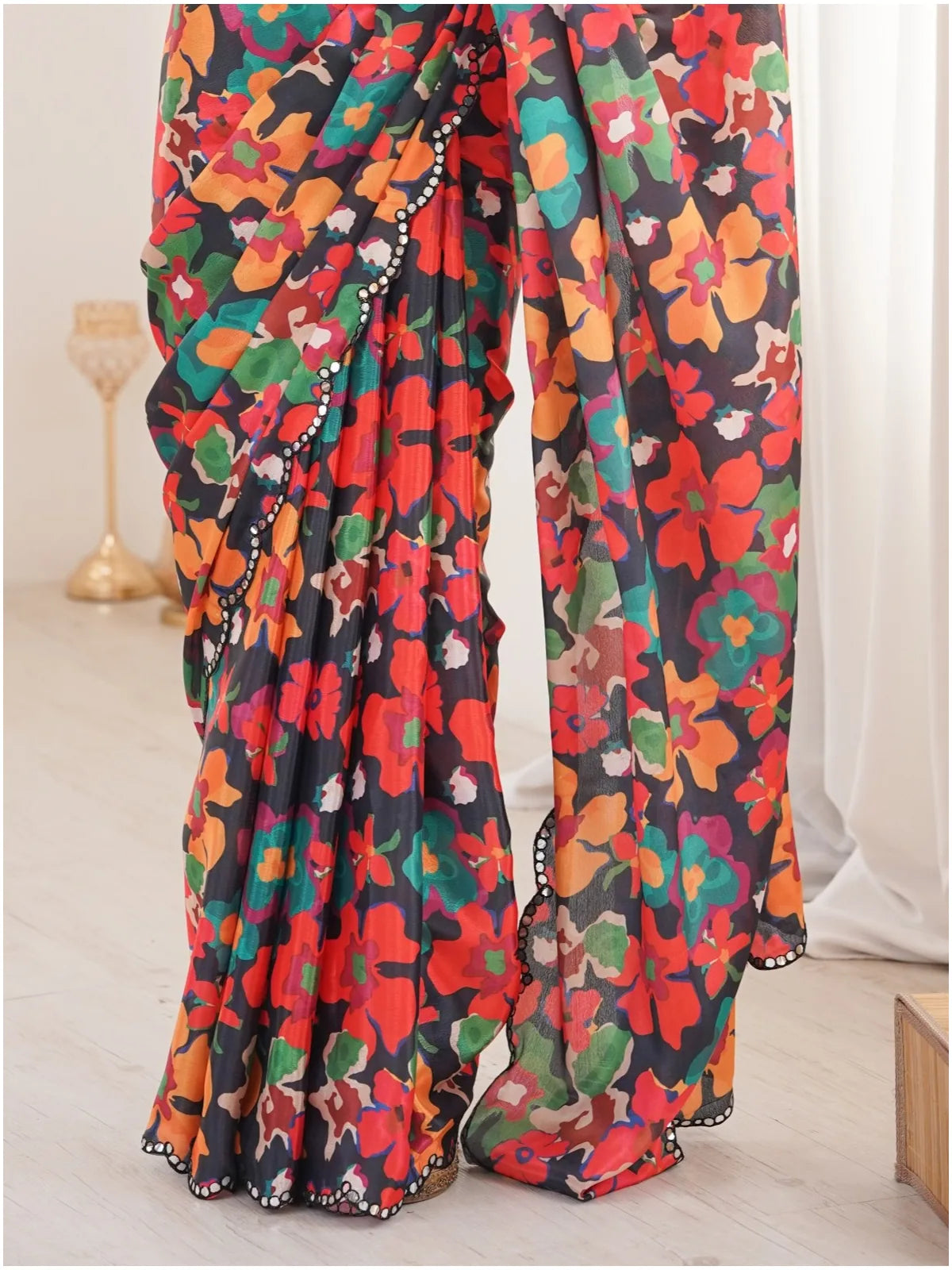 Tarani heavy chinnon black floral print saree with mirror border pallu view