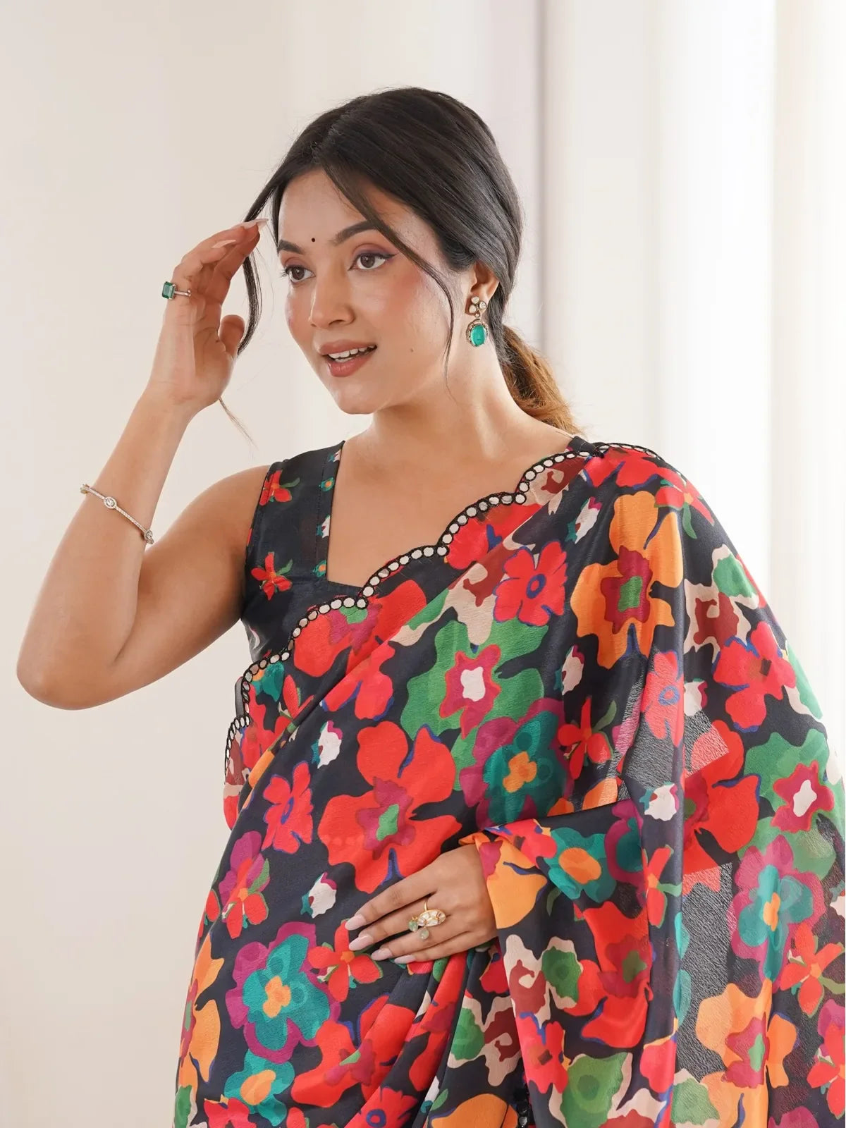 Tarani heavy chinnon black floral print saree with mirror border upper body view