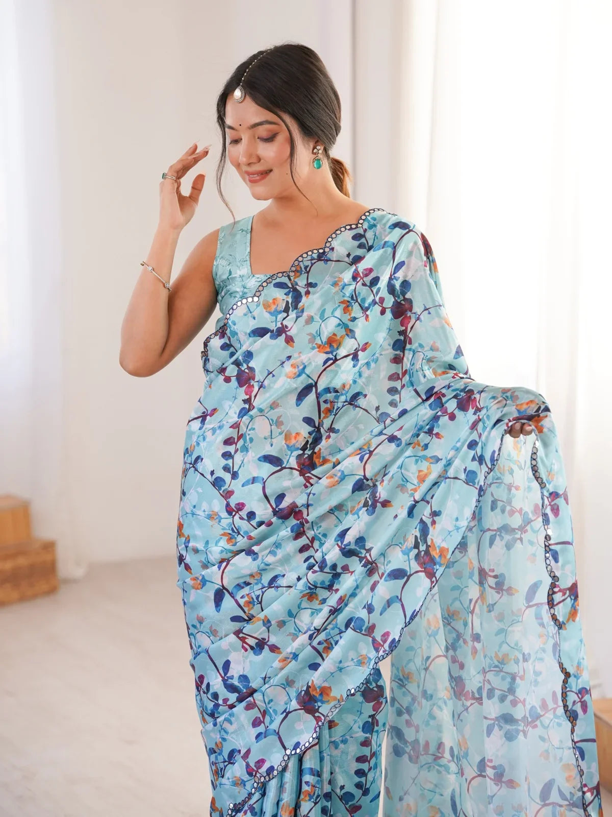 Tarani premium blue chinnon saree upper body view showing blouse and scallop mirror work