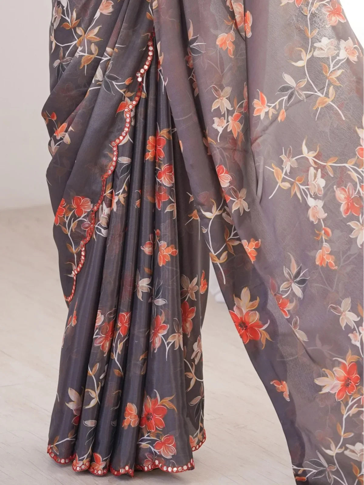 Tarani closeup of grey floral chinnon saree with mirror scallop pallu design