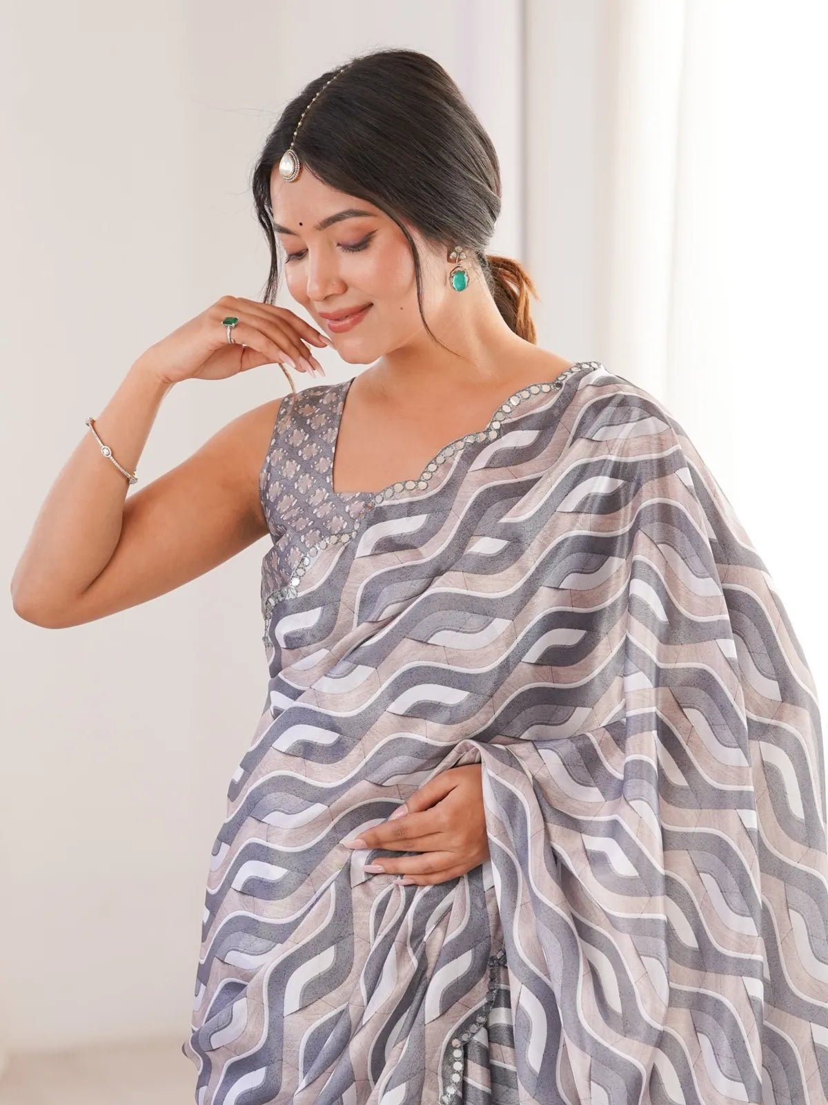 Tarani chinnon saree upper body view showing blouse and elegant neckline