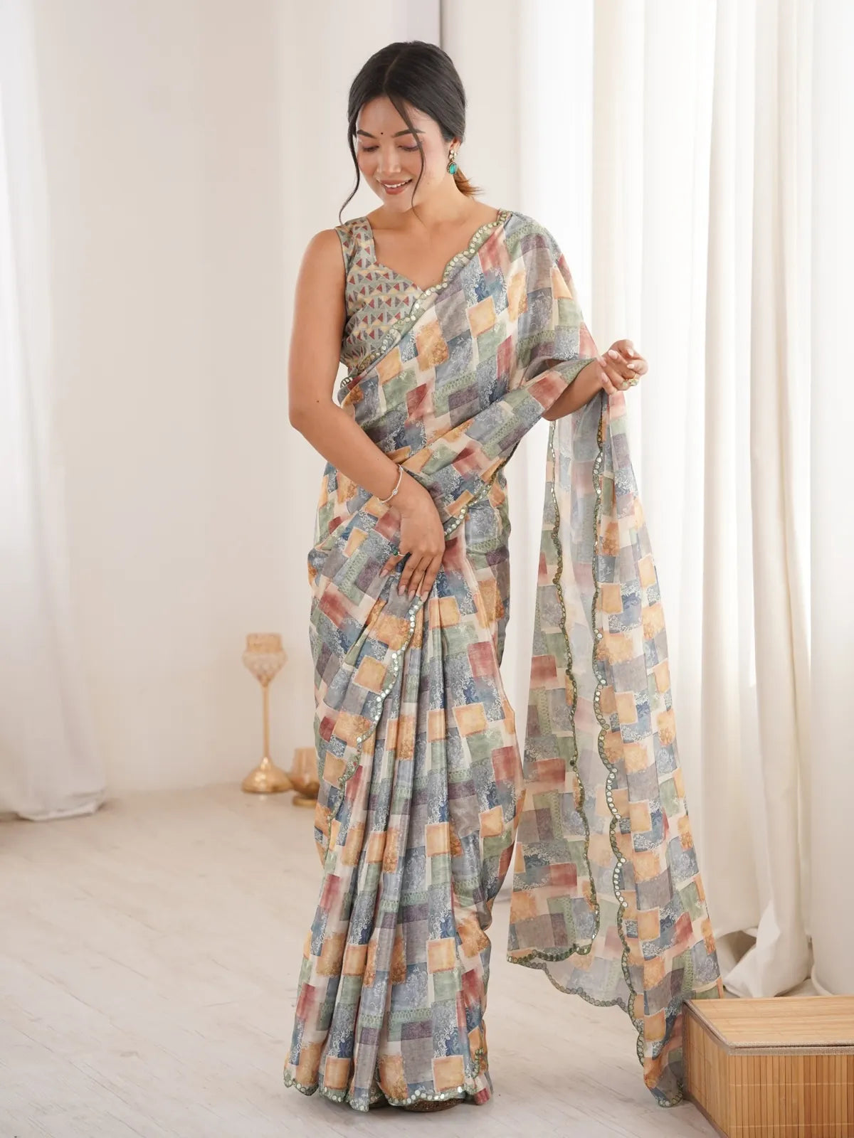 Tarani multicolor chinnon saree full view with mirror border and geometric blouse