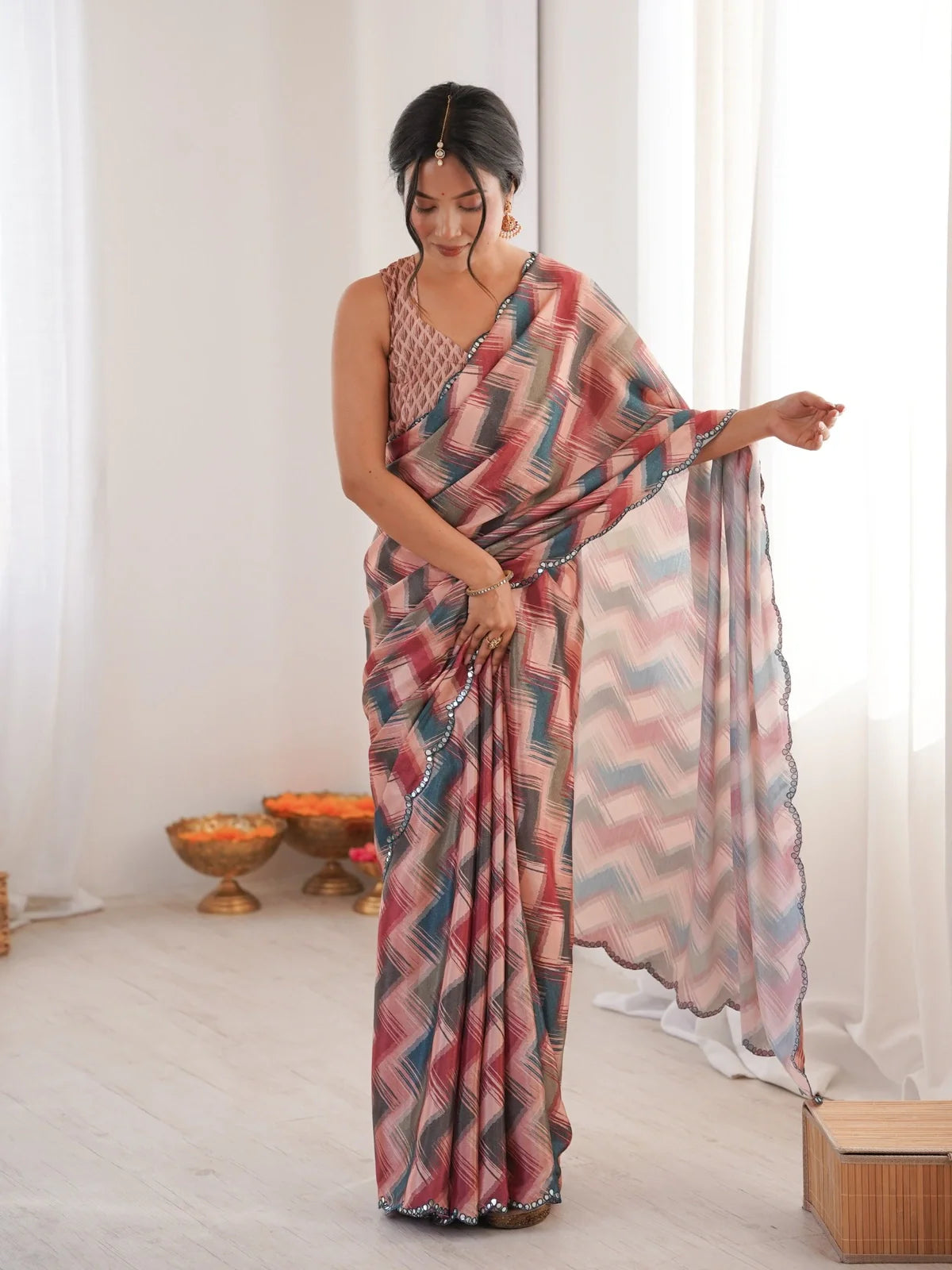 Tarani multicolor chinnon saree full view with geometric print and scalloped mirror border