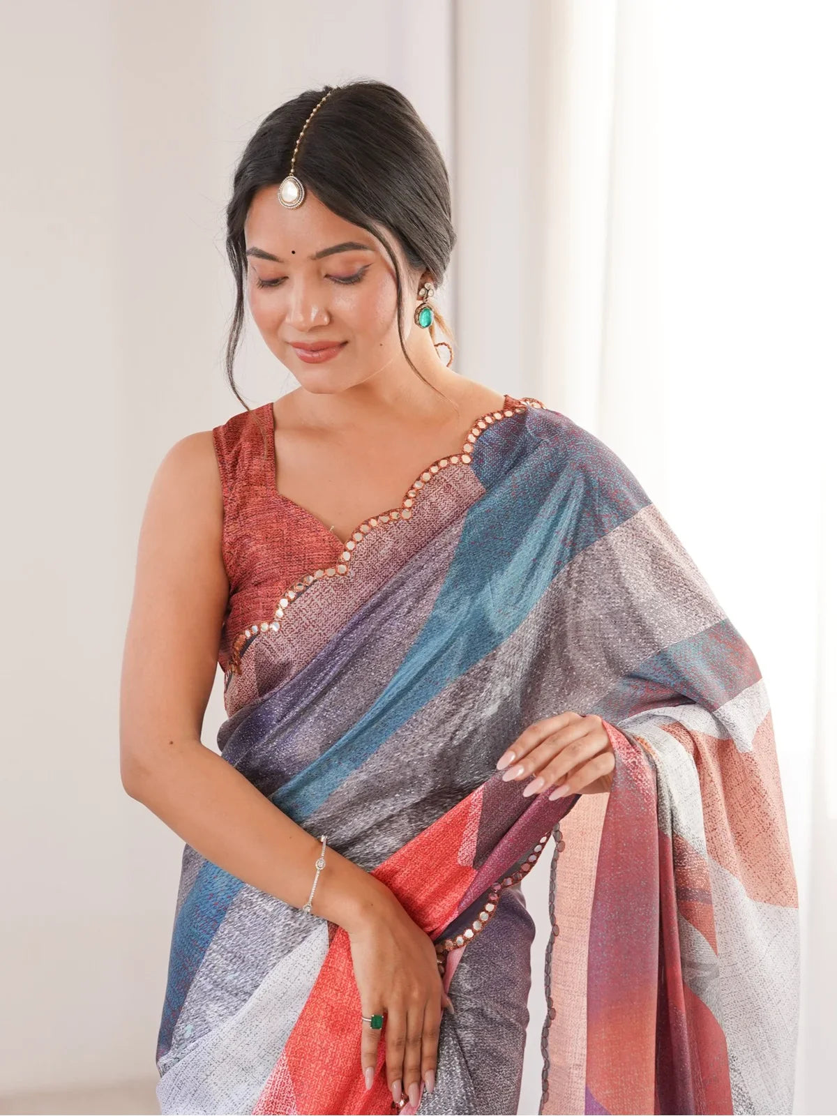 Tarani multicolor saree upper body view showing scalloped blouse and mirror border details