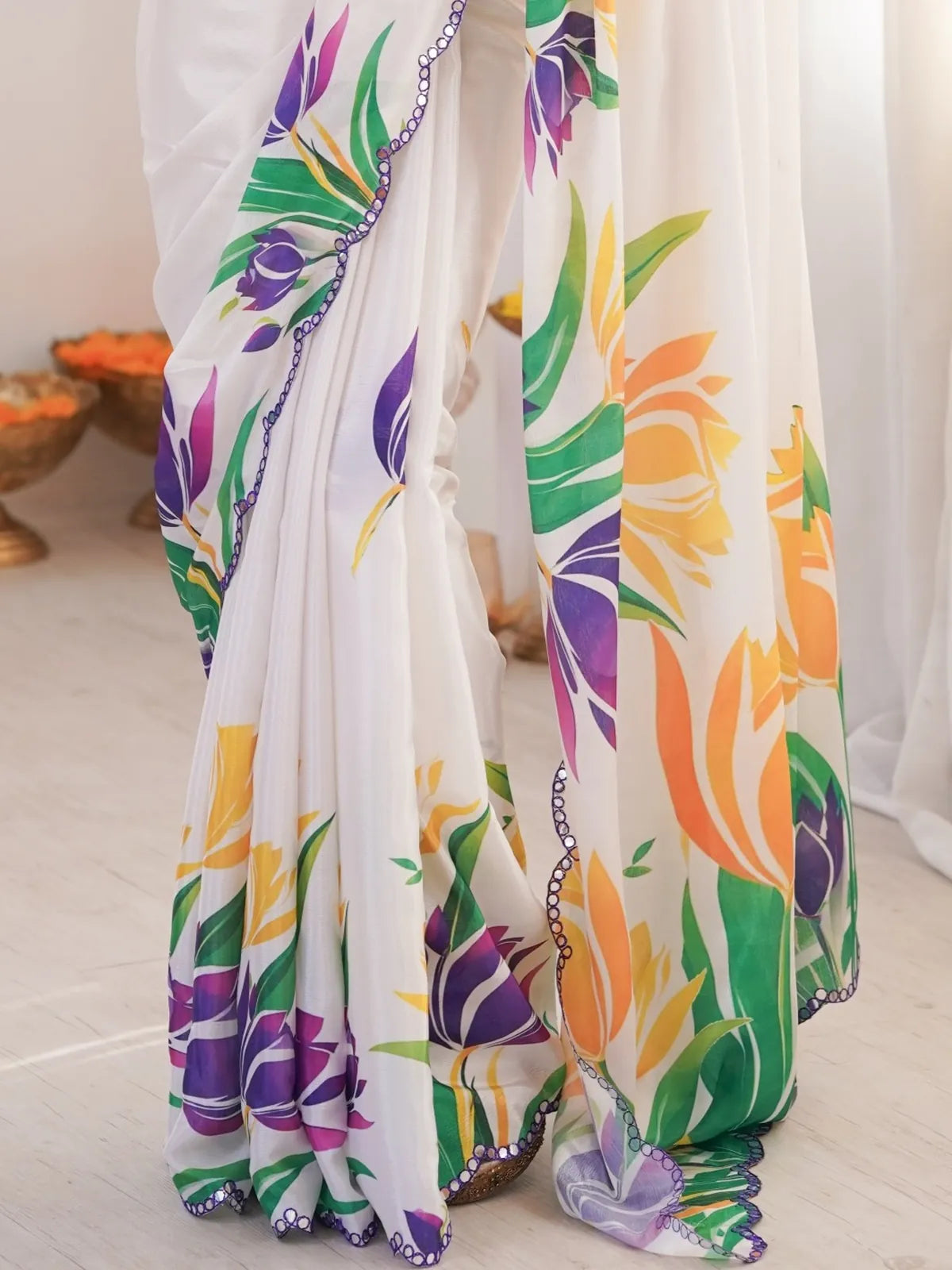 Tarani chinnon saree with colorful tulip print, purple mirror border and soft texture closeup