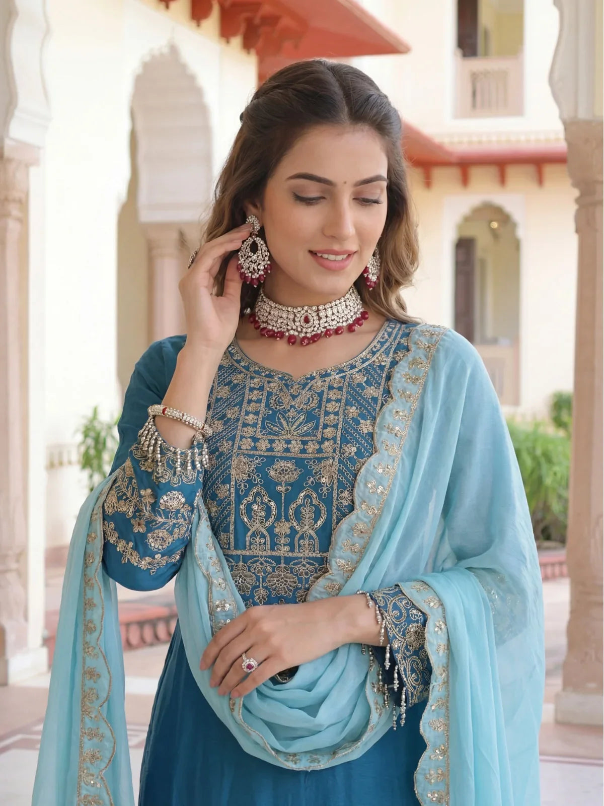 Tarani chinon silk blue festive dress with detailed embroidery and neckline closeup