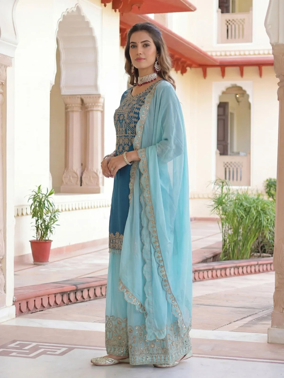 Tarani blue chinon festive party wear dress side pose with embroidered dupatta
